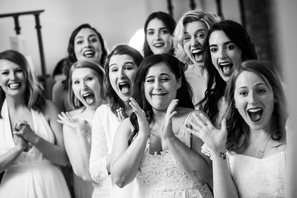 Bridesmaids seeing bride in wedding dress for Carnivale Chicago wedding captured by J Brown Photography