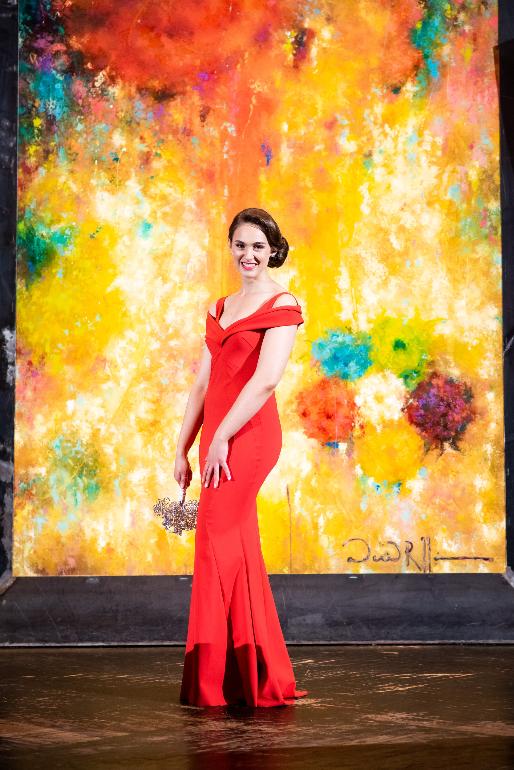 Bridal portrait of bride in red wedding dress for Carnivale Chicago wedding captured by J Brown Photography
