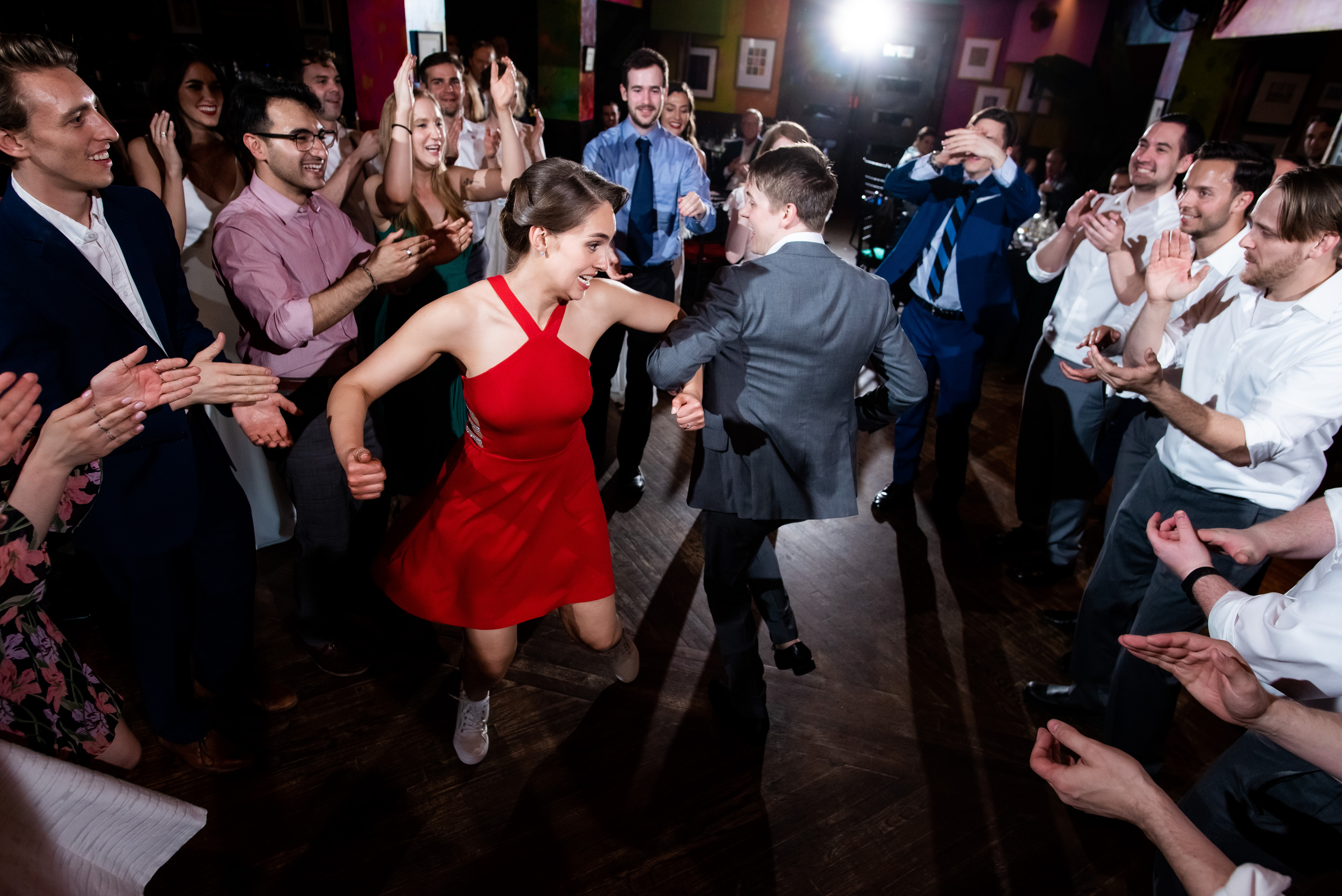 Bride and groom dancing during Carnivale Chicago wedding captured by J Brown Photography