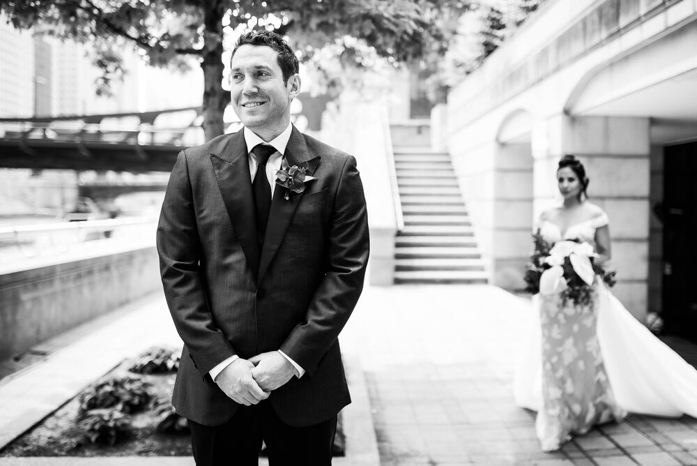 Wedding first look: Alder Planetarium Chicago Wedding captured by J. Brown Photography