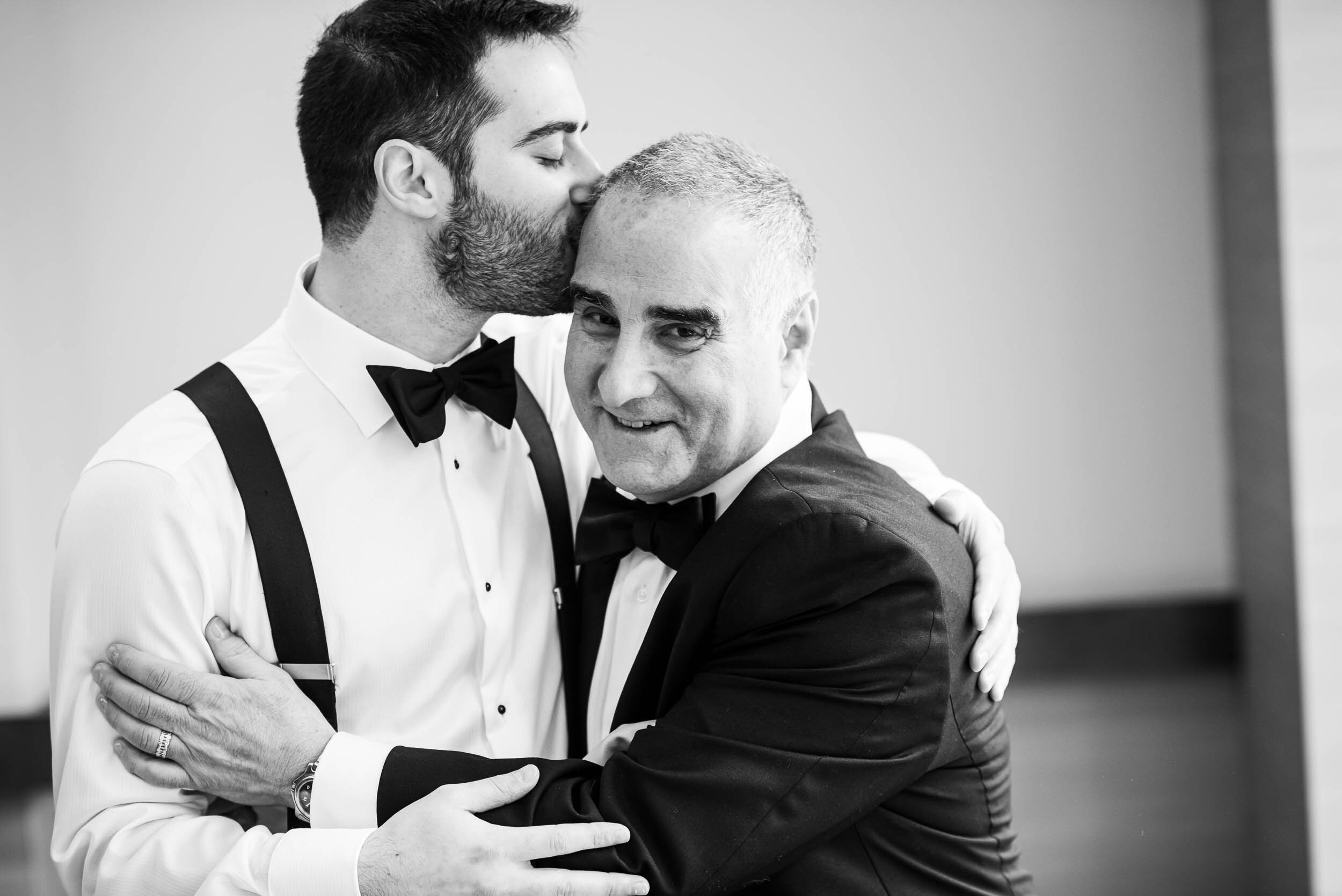 Groom and father of the groom portrait: Loews Chicago Hotel Wedding captured by J. Brown Photography