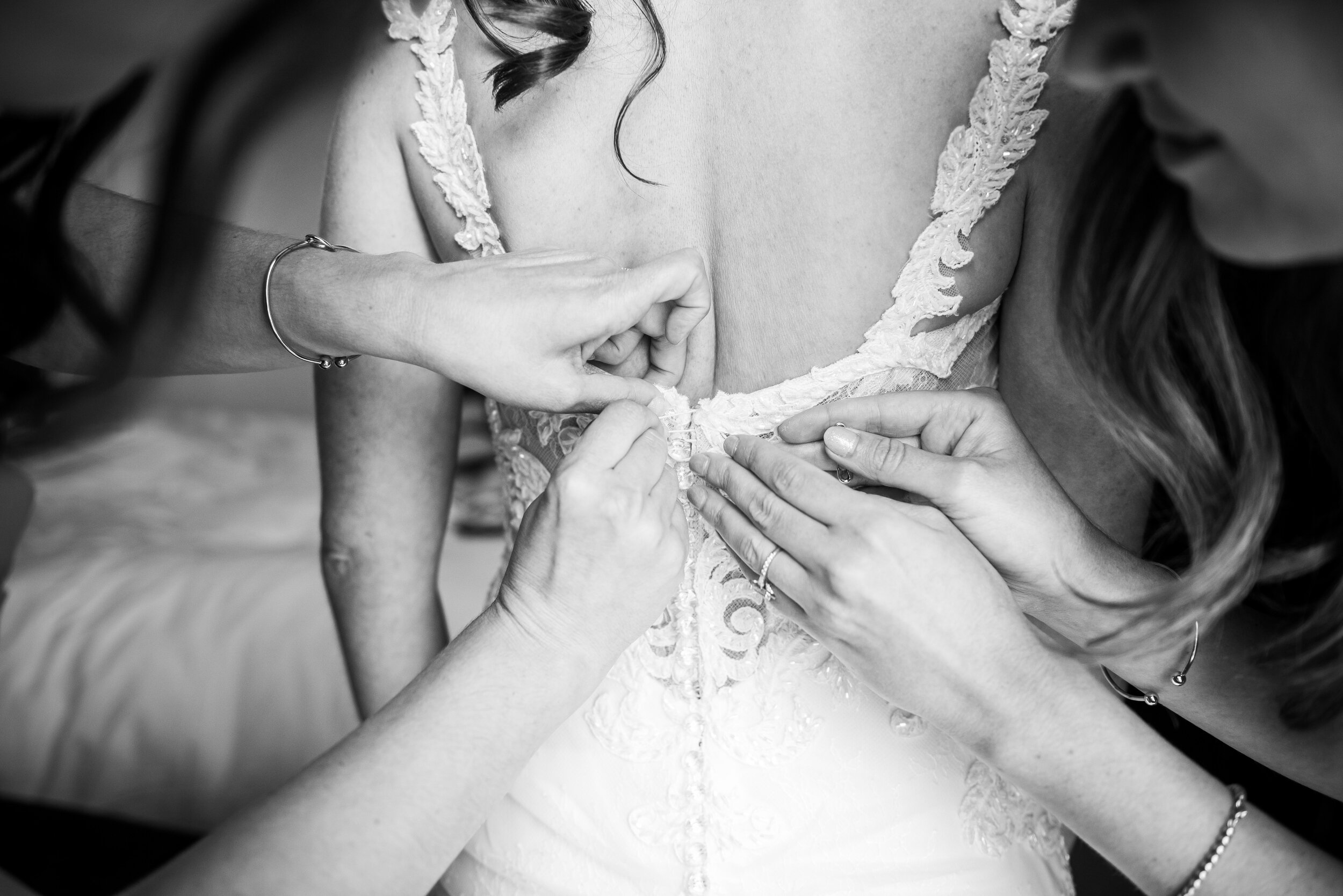 Wedding dress button details: Loews Chicago Hotel Wedding captured by J. Brown Photography