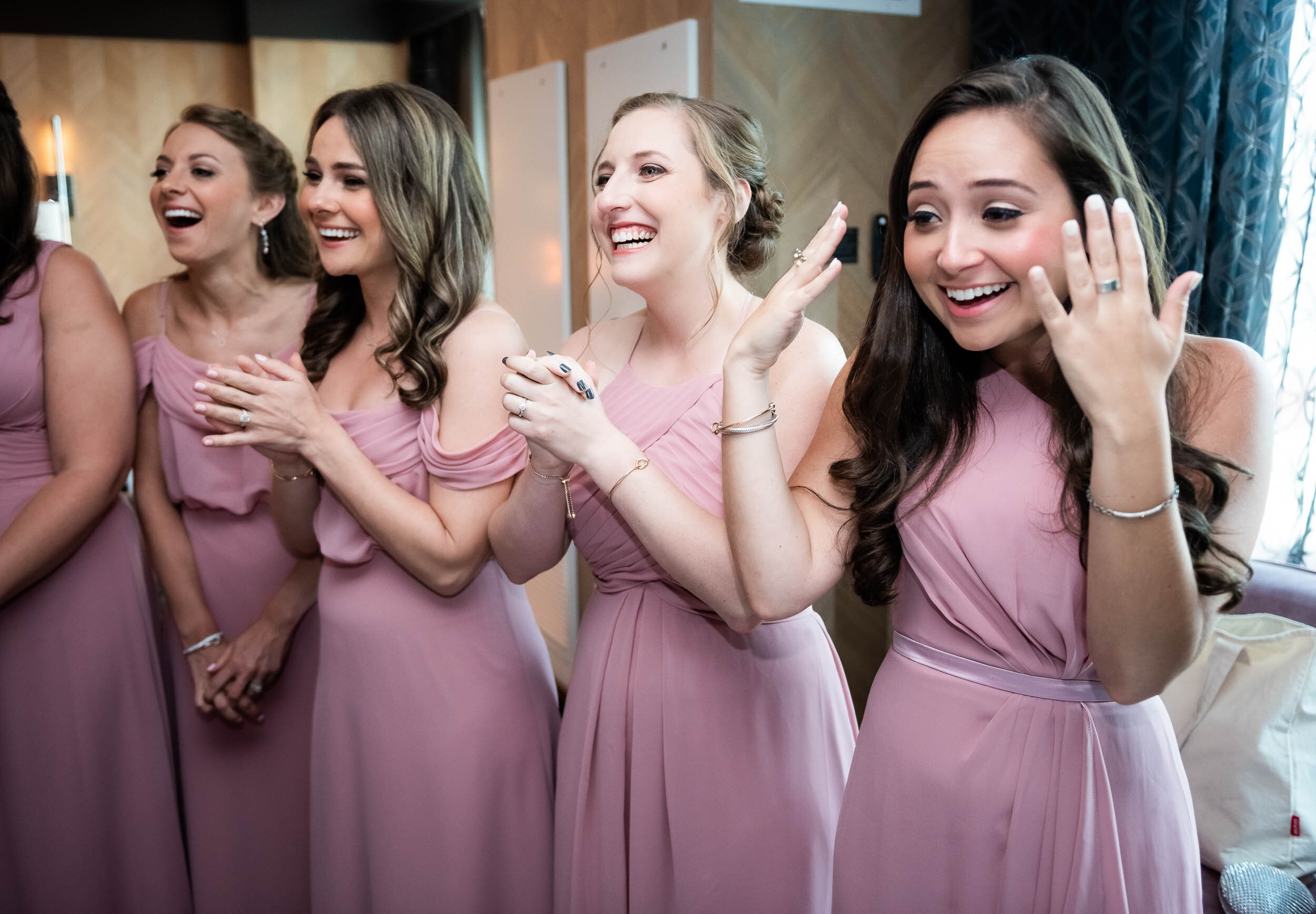 Bridal party first look | mauve bridesmaid dresses: Loews Chicago Hotel Wedding captured by J. Brown Photography