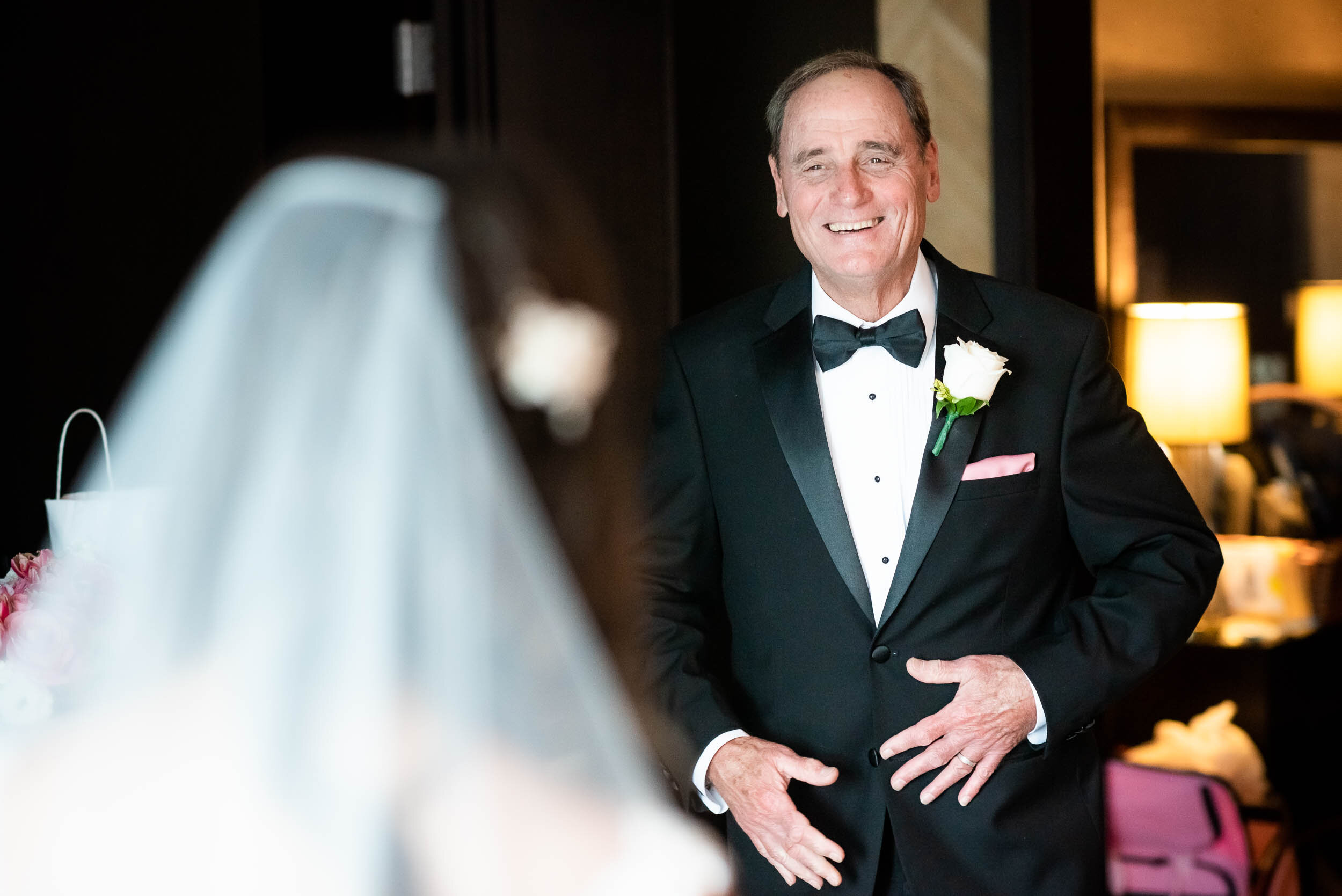 Father of the bride first look: Loews Chicago Hotel Wedding captured by J. Brown Photography