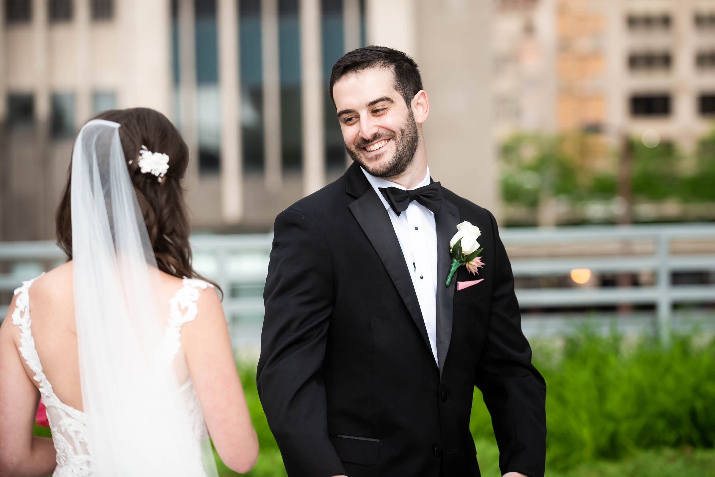 Bride and groom terrace first look: Loews Chicago Hotel Wedding captured by J. Brown Photography