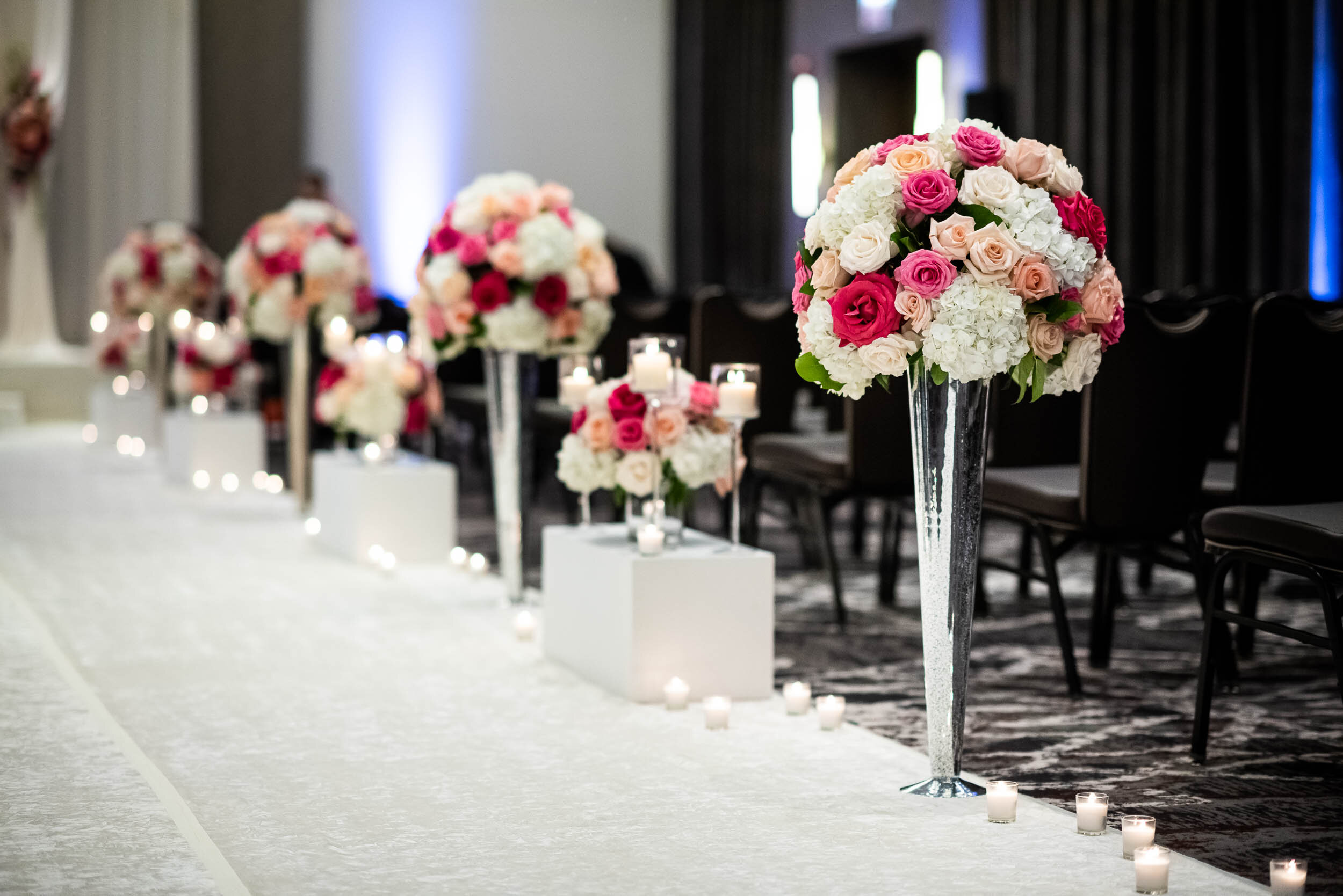 Pink and white wedding ceremony flowers: Loews Chicago Hotel Wedding captured by J. Brown Photography