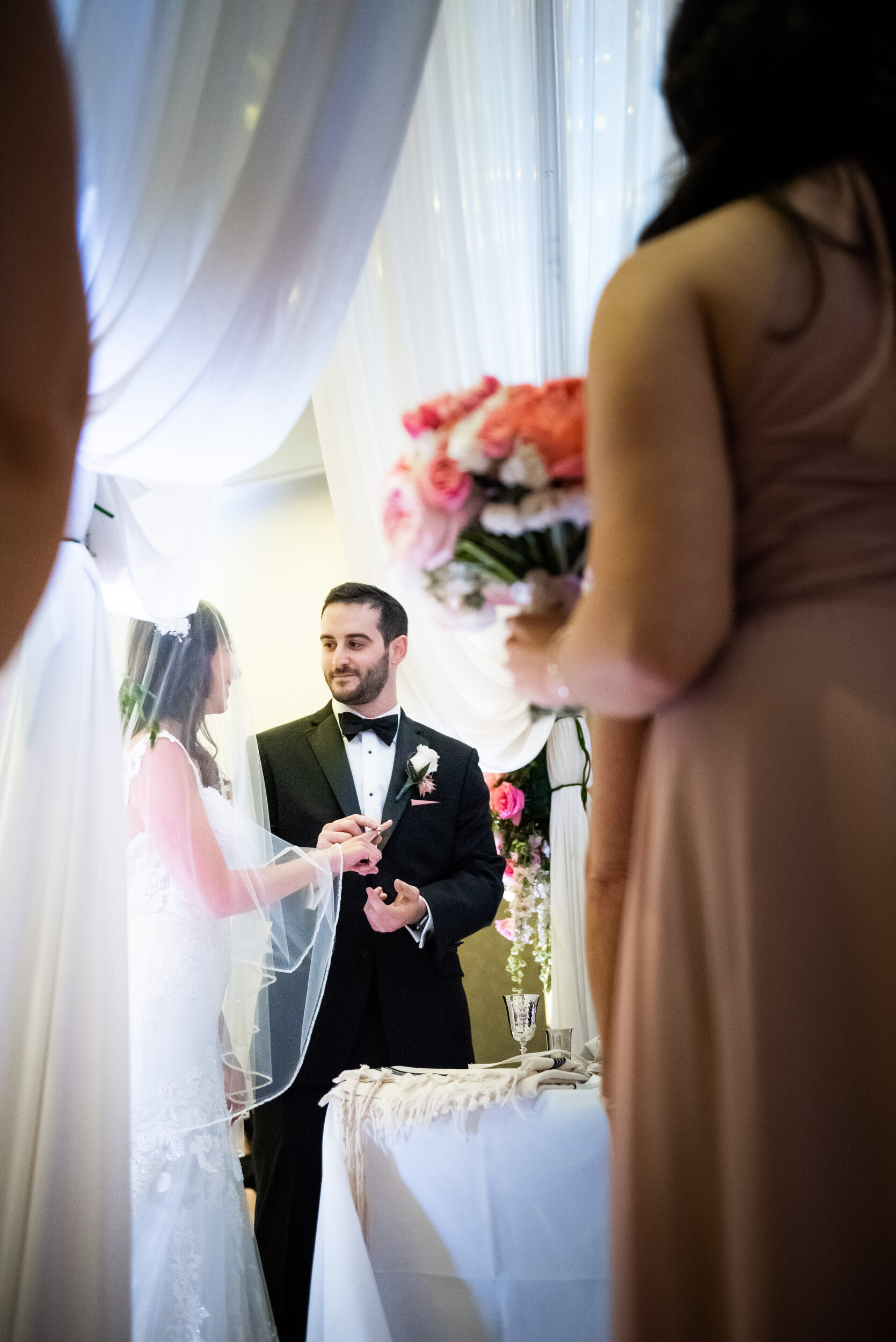 Wedding ceremony photography: Loews Chicago Hotel Wedding captured by J. Brown Photography