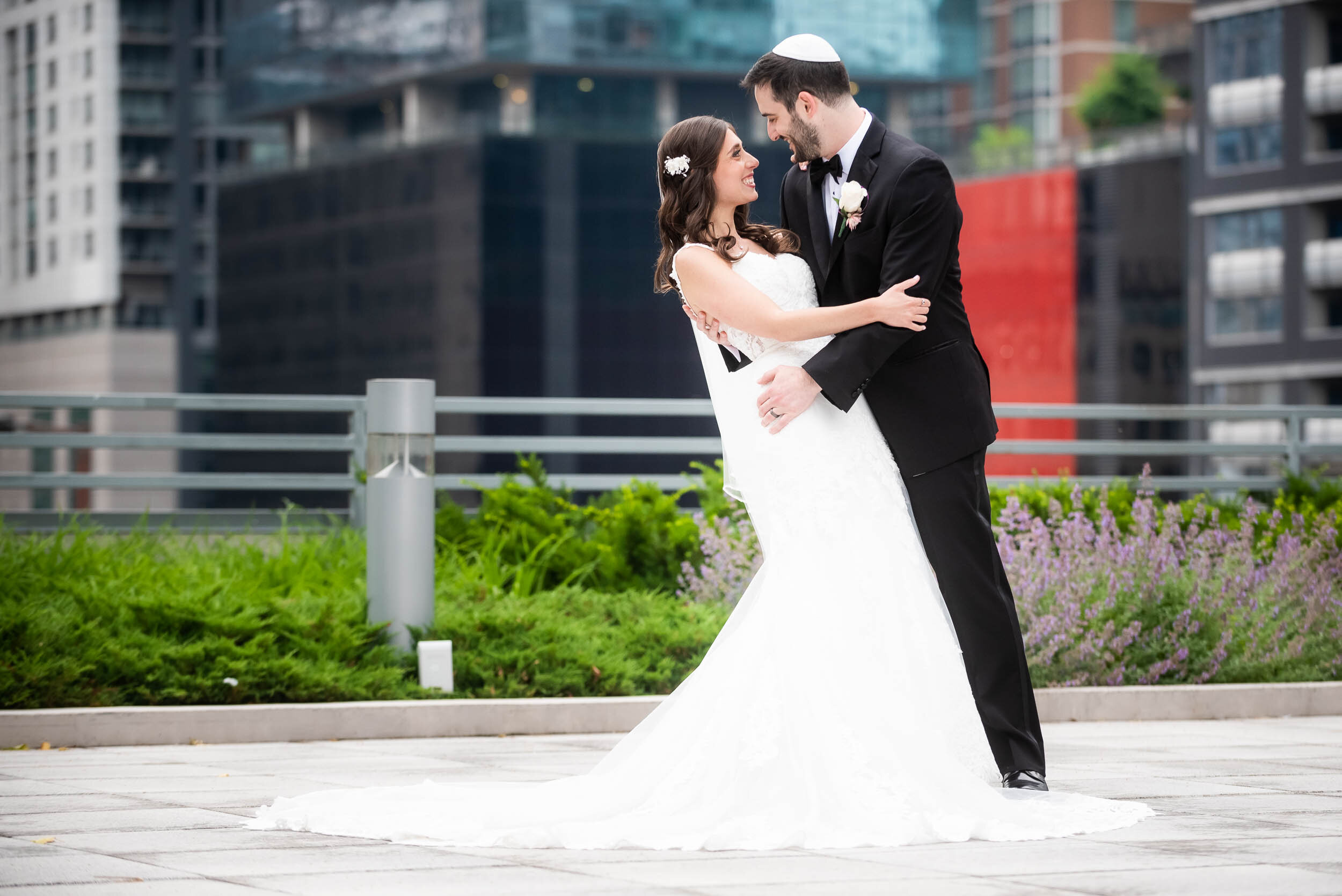 Outdoor terrace wedding photos: Loews Chicago Hotel Wedding captured by J. Brown Photography