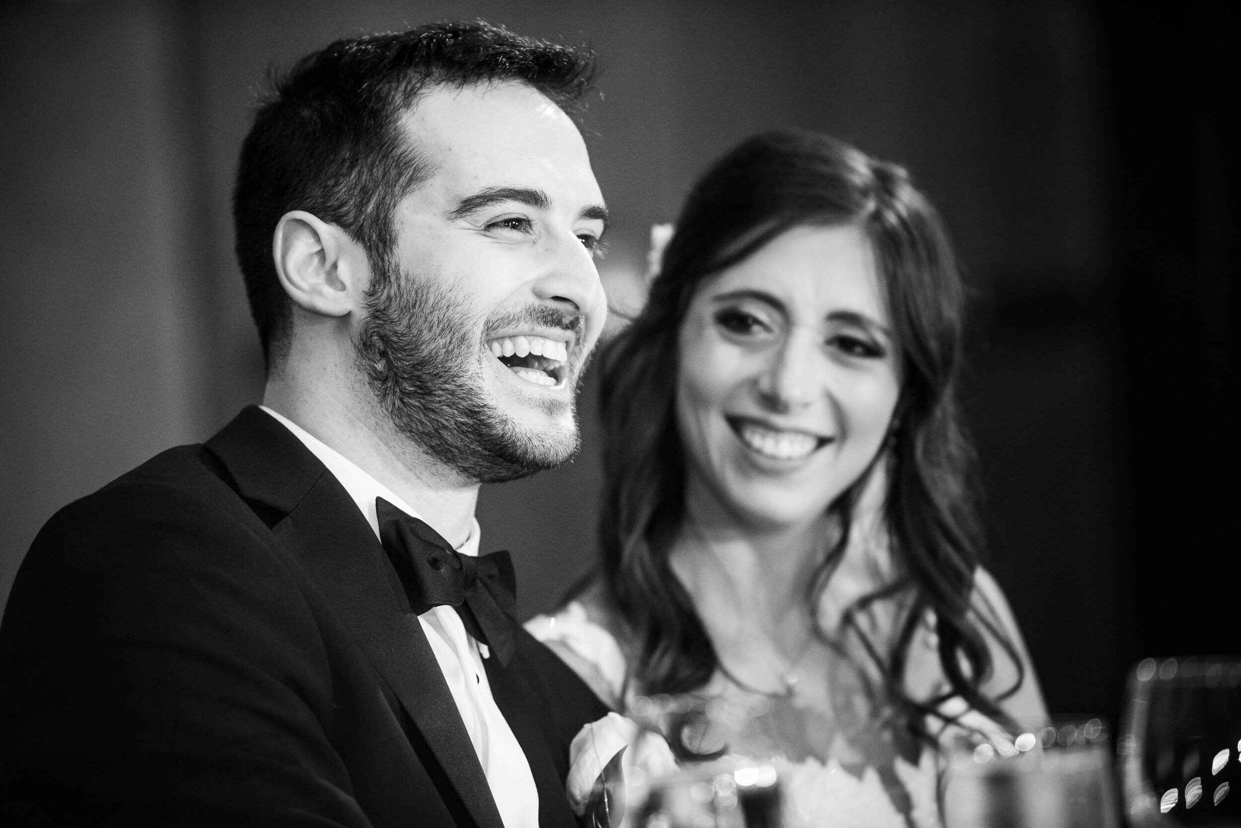 Bride and groom laughing: Loews Chicago Hotel Wedding captured by J. Brown Photography