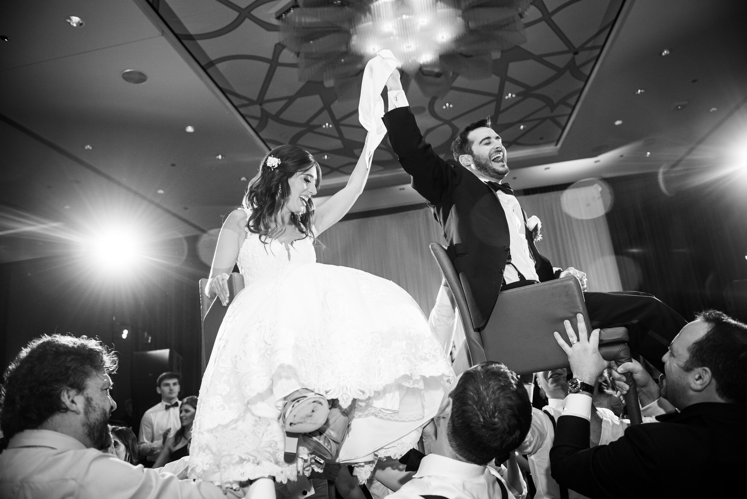 Candid wedding photography: Loews Chicago Hotel Wedding captured by J. Brown Photography