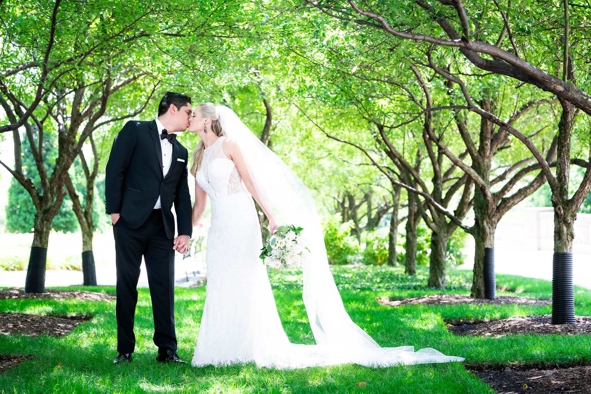 Outdoor wedding portrait: Carnivale Chicago Wedding captured by J. Brown Photography