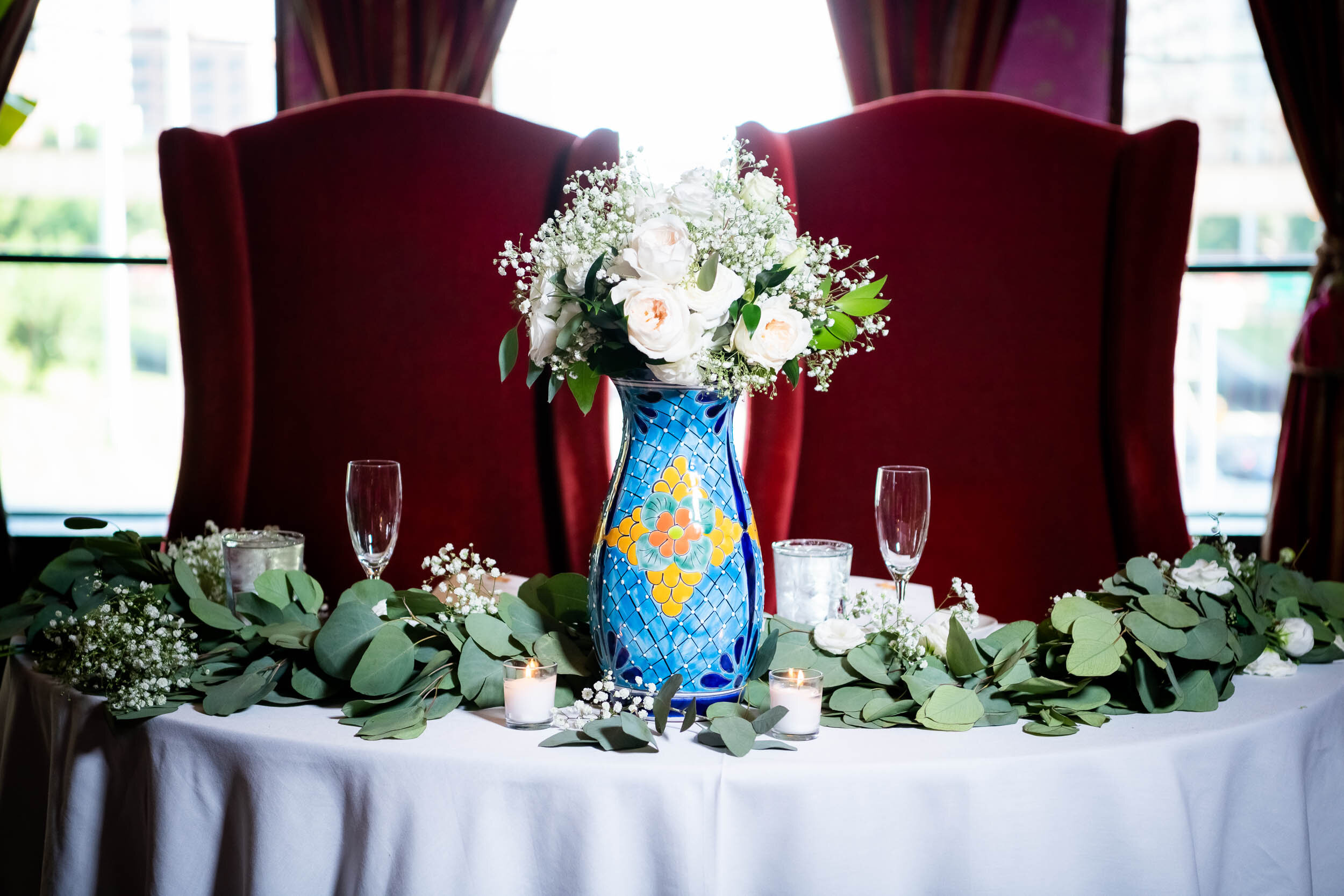 Wedding sweetheart table decor: Carnivale Chicago Wedding captured by J. Brown Photography