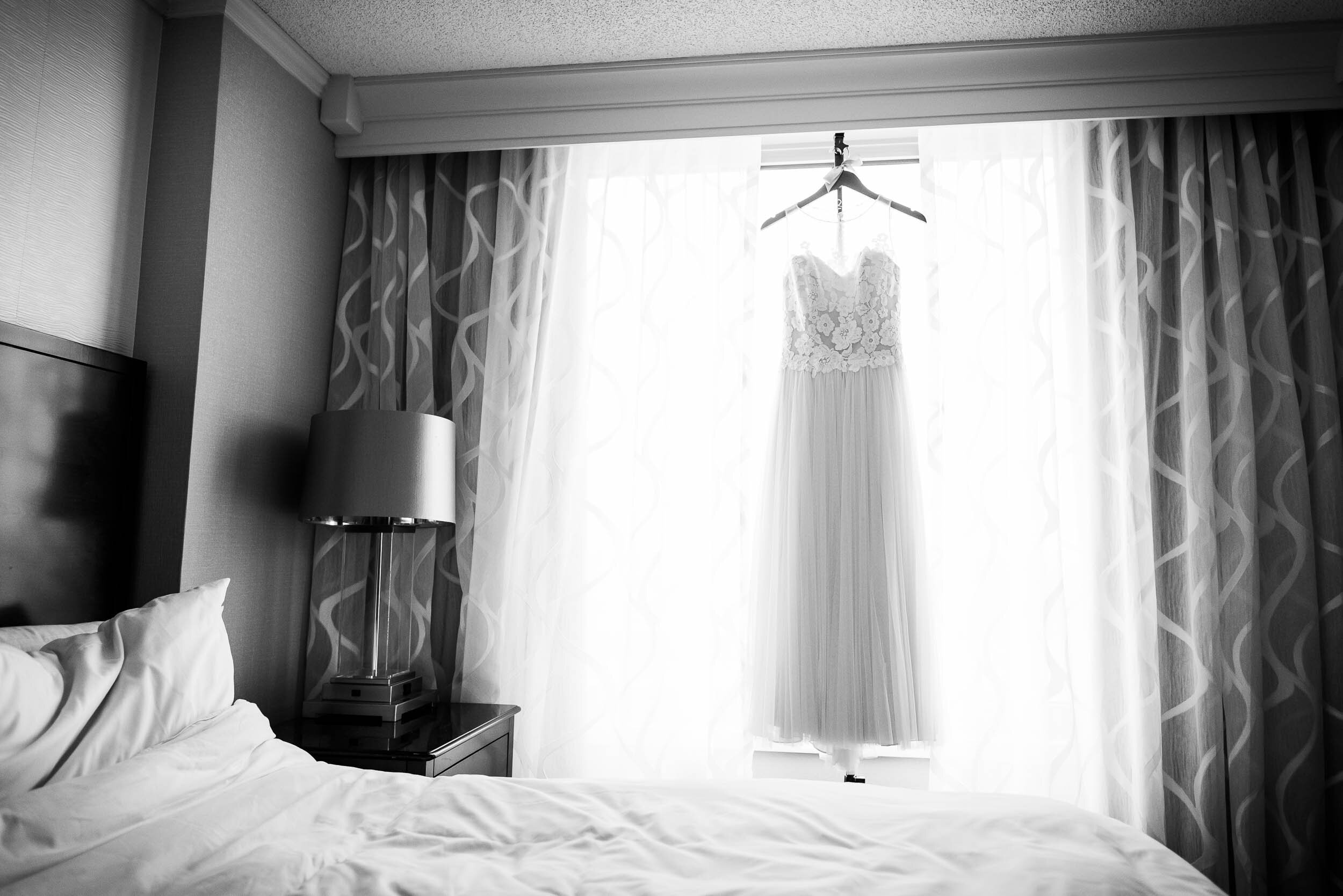 Wedding dress detail photo during a Chevy Chase Country Club wedding by J. Brown Photography.