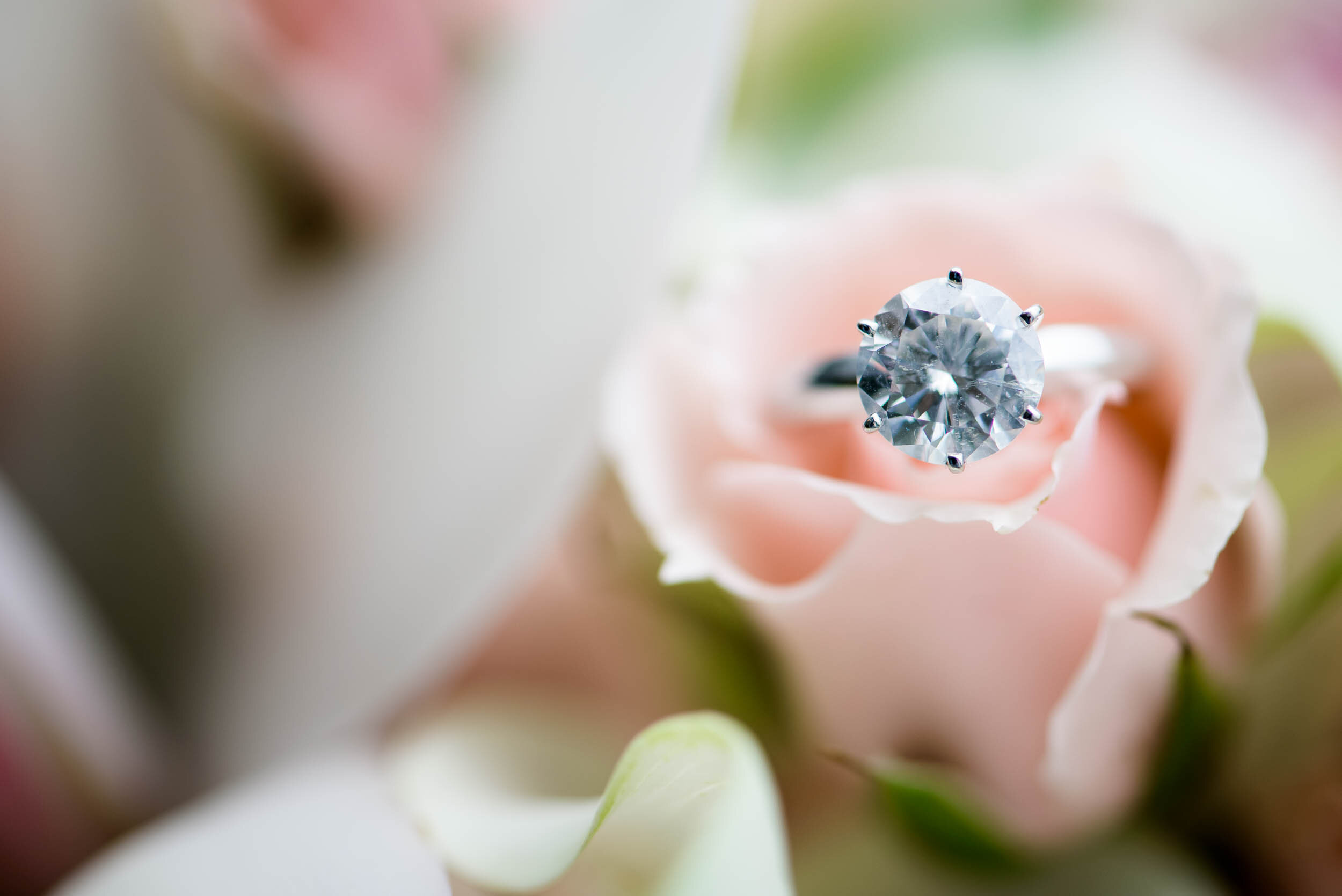 Engagement wedding ring close up photo during a Chevy Chase Country Club wedding by J. Brown Photography.