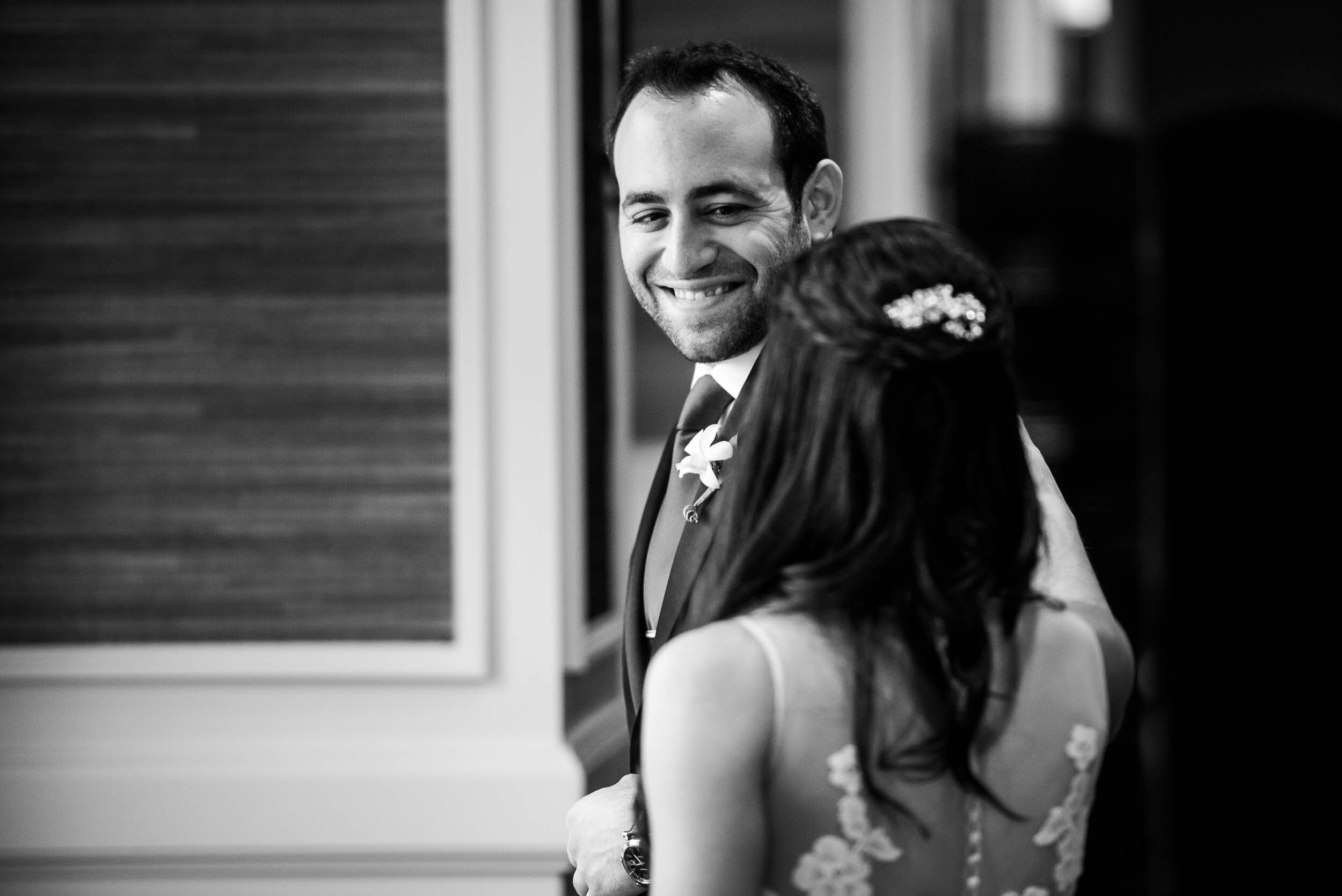 Bride and groom first look during a Chevy Chase Country Club wedding by J. Brown Photography.