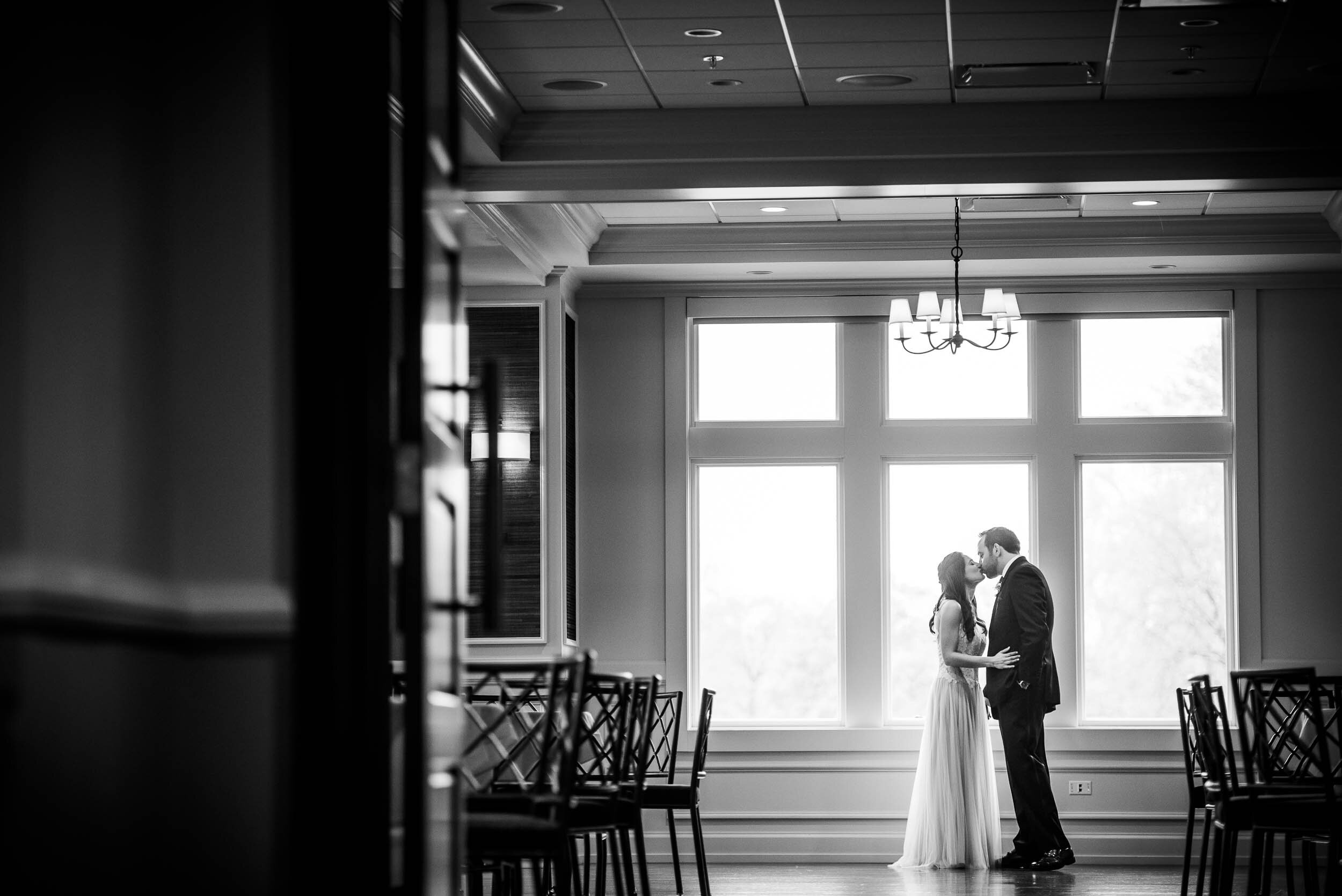 Indoor wedding portrait during a Chevy Chase Country Club wedding by J. Brown Photography.