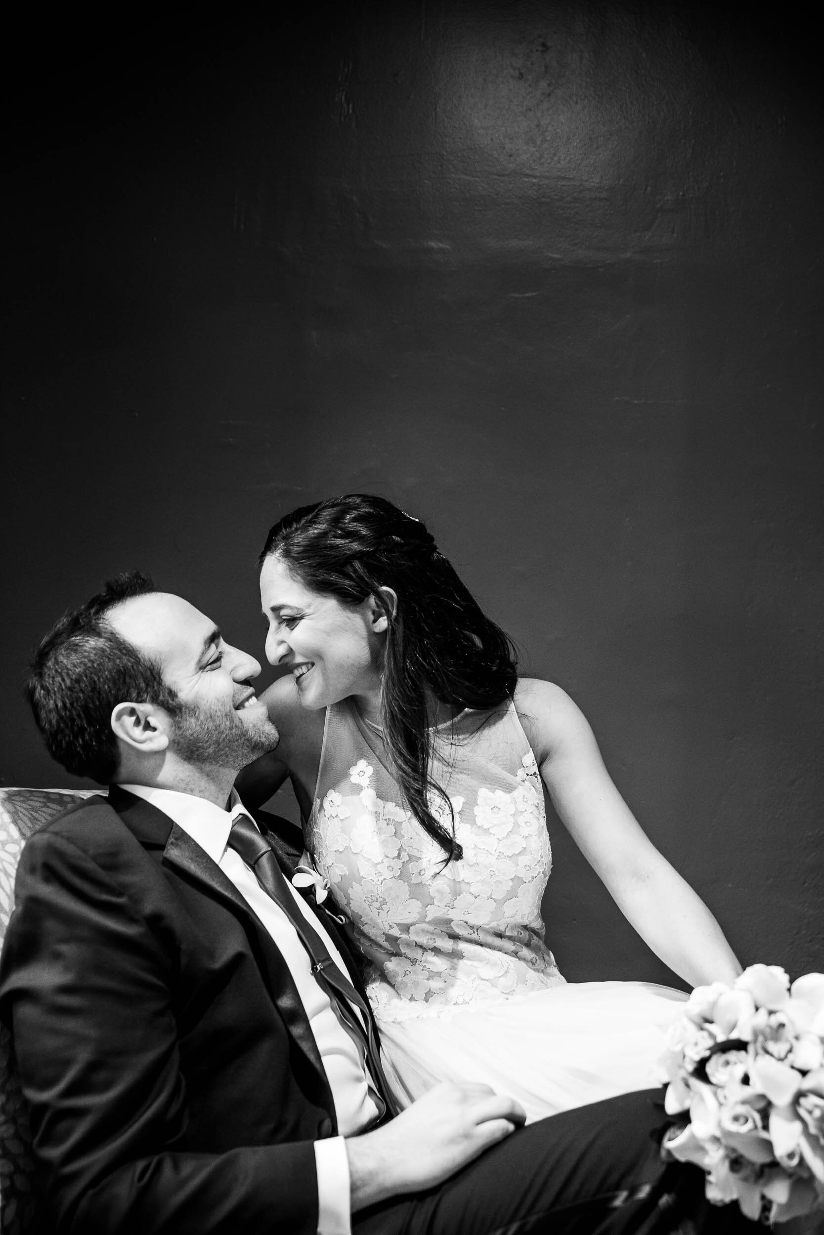 Indoor wedding portrait of the bride and groom during a Chevy Chase Country Club wedding by J. Brown Photography.