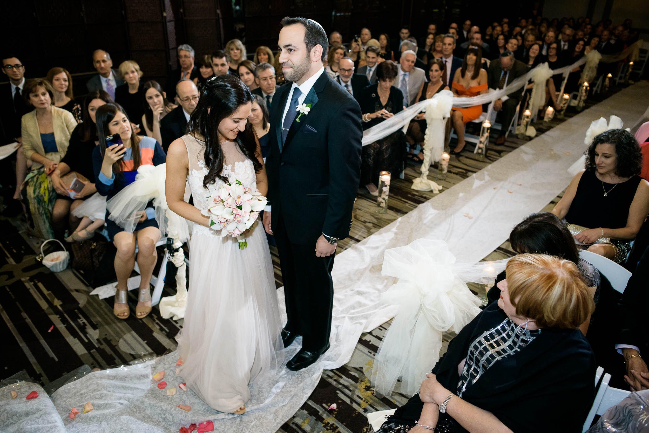 Bride and groom during a Chevy Chase Country Club jewish wedding by J. Brown Photography.