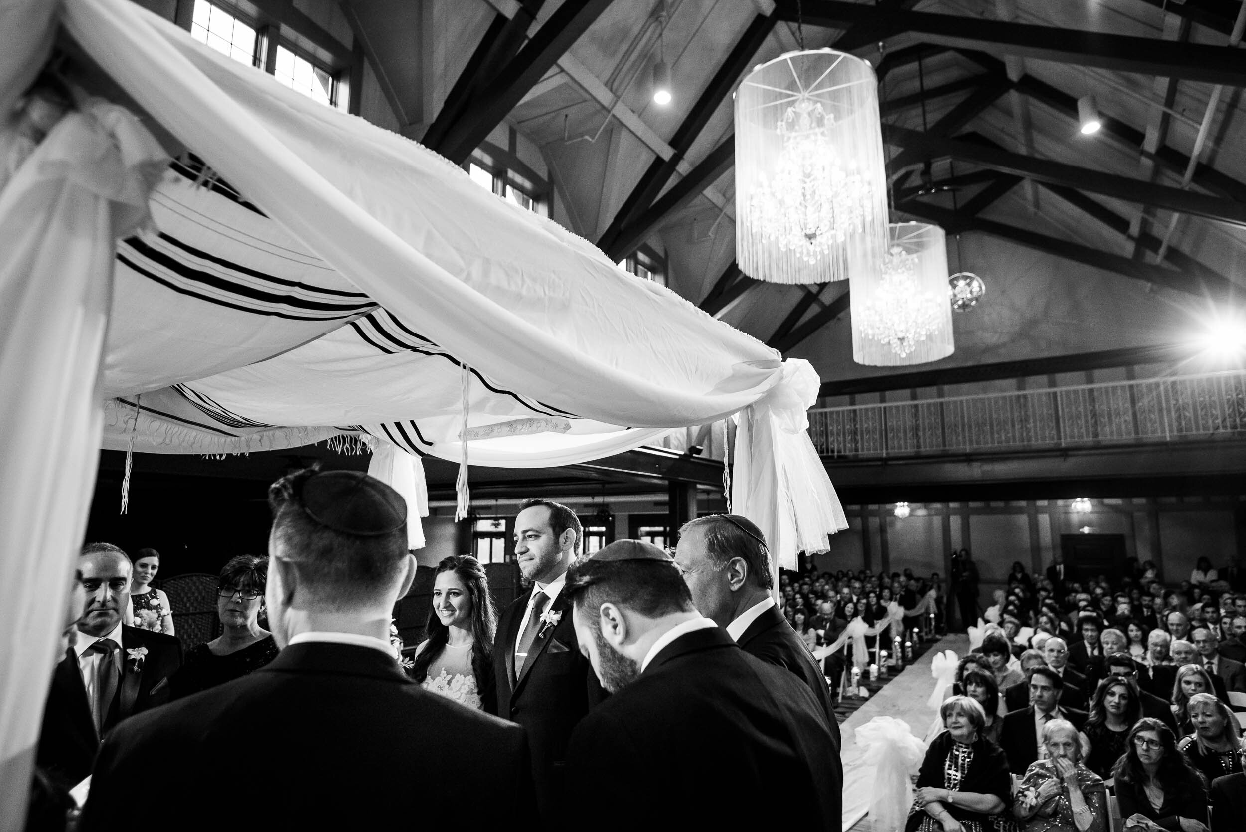 Wedding ceremony during a Chevy Chase Country Club jewish wedding by J. Brown Photography.