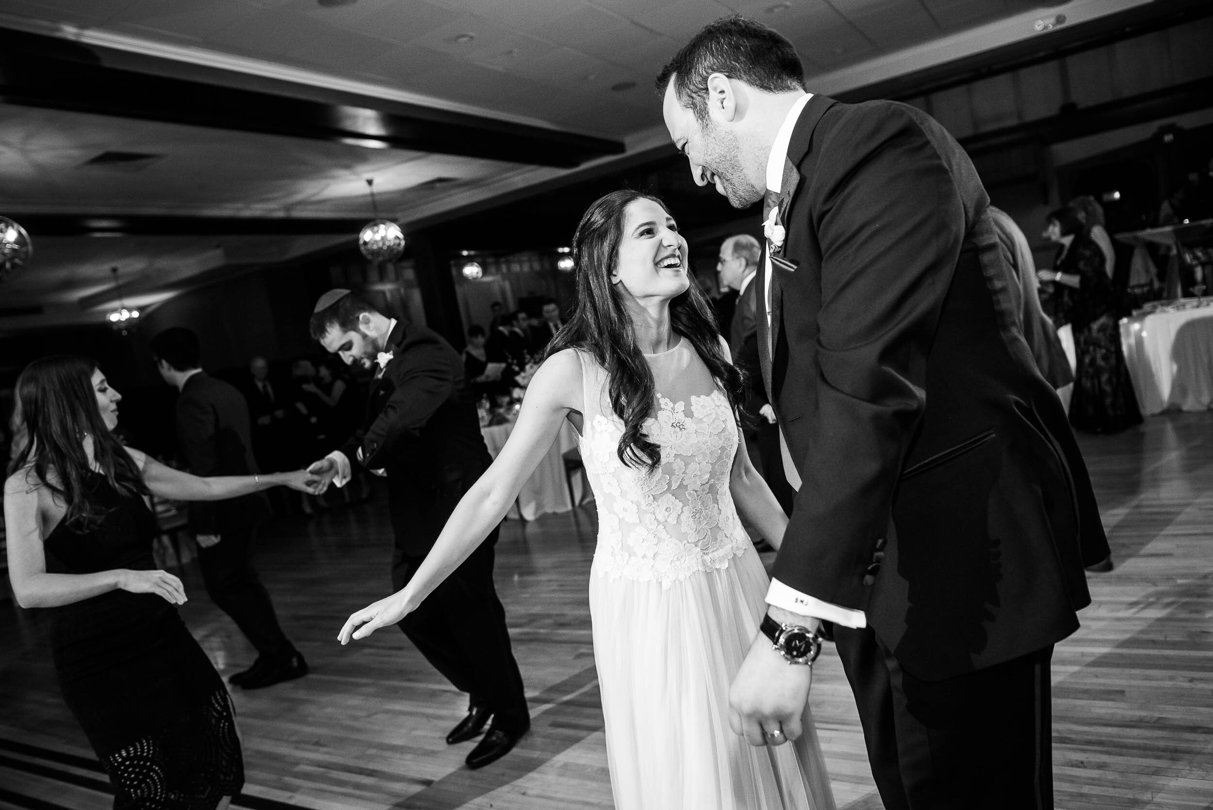 Dance floor moment during a Chevy Chase Country Club jewish wedding by J. Brown Photography.