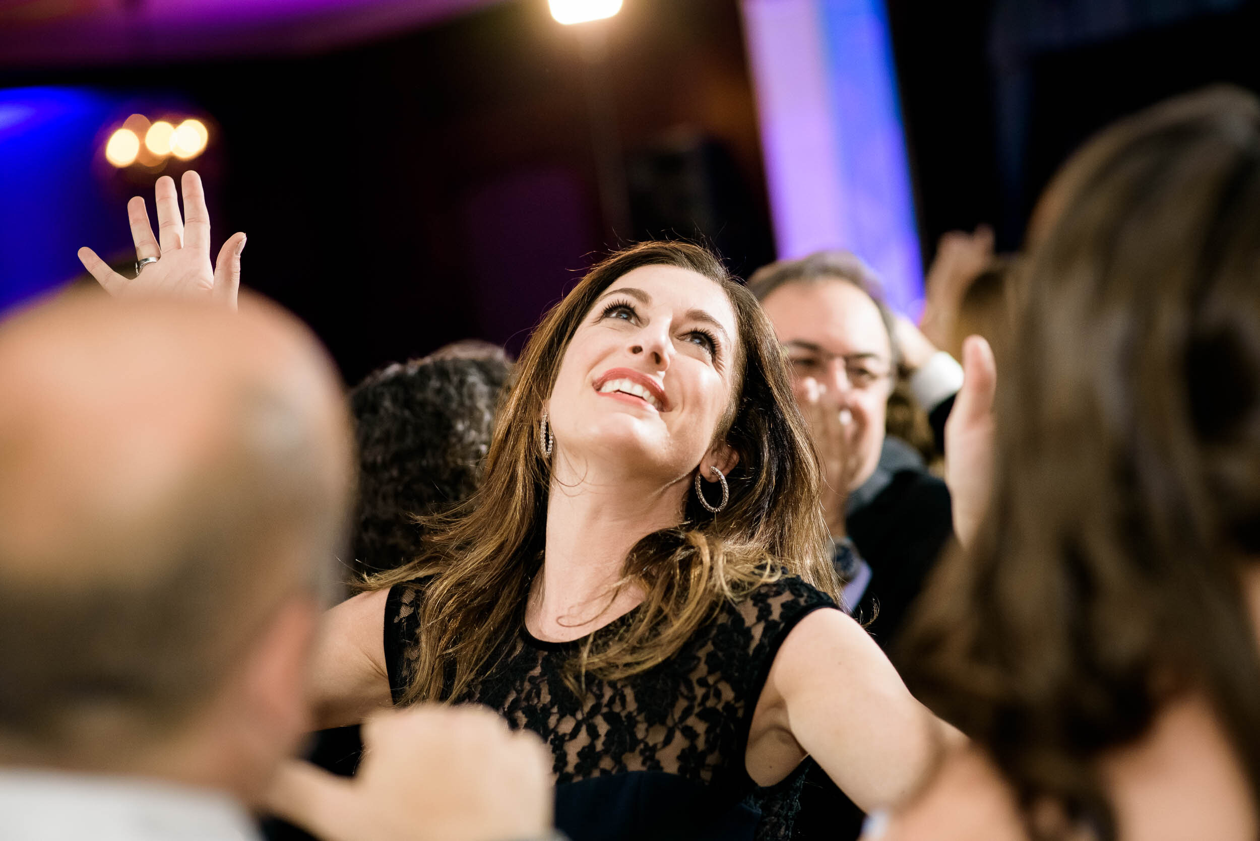 Dance floor moment during a Chevy Chase Country Club jewish wedding by J. Brown Photography.