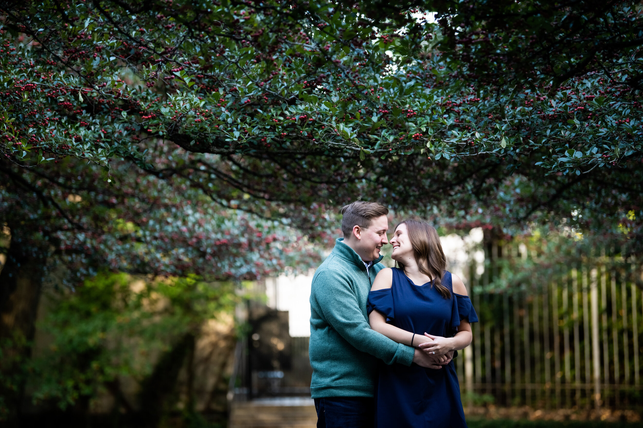 Bride and groom embrace during their engagement session at the Art Institute of Chicago.  