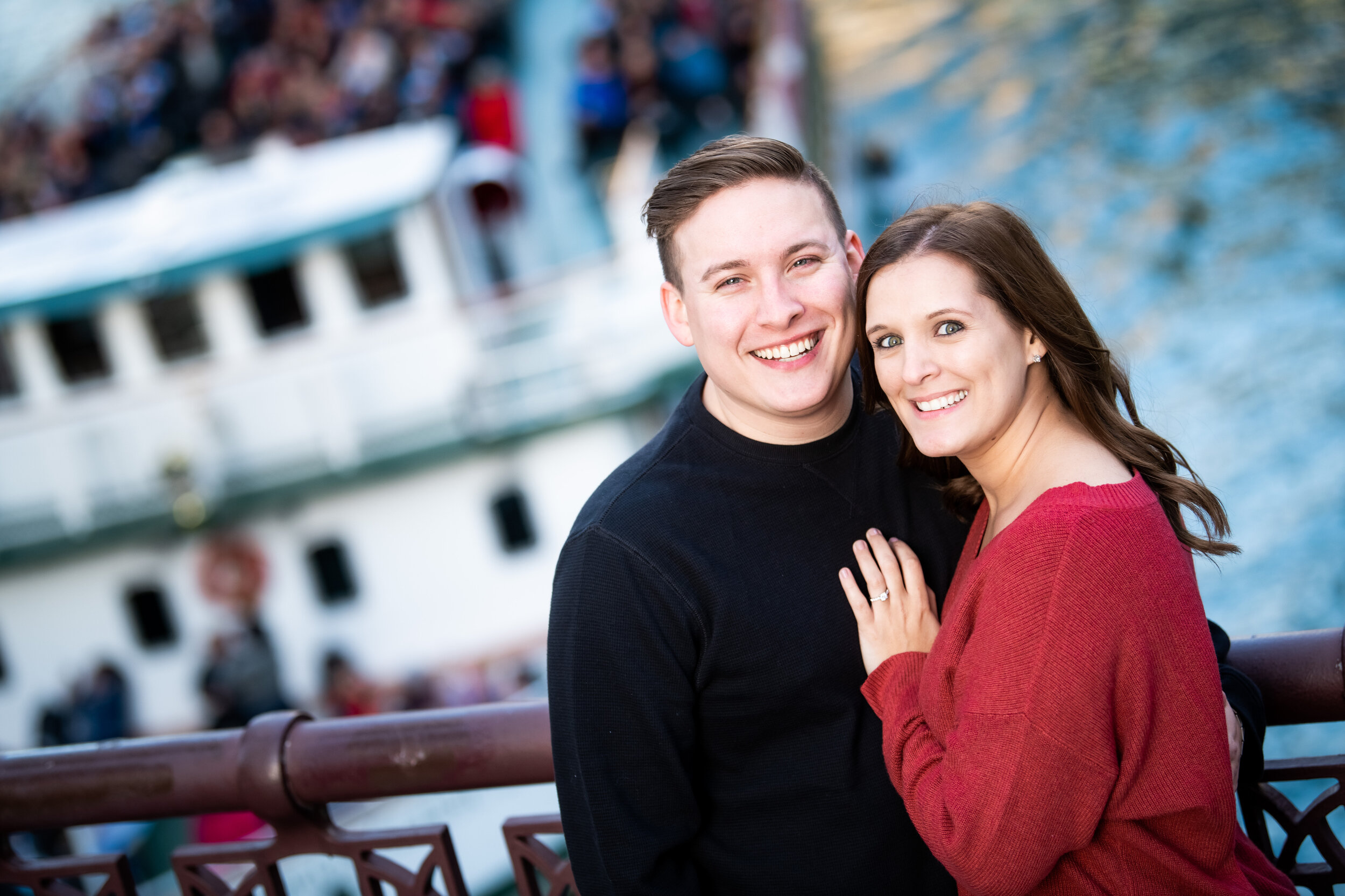 Engagement portrait of bride and groom on the Chicago River.