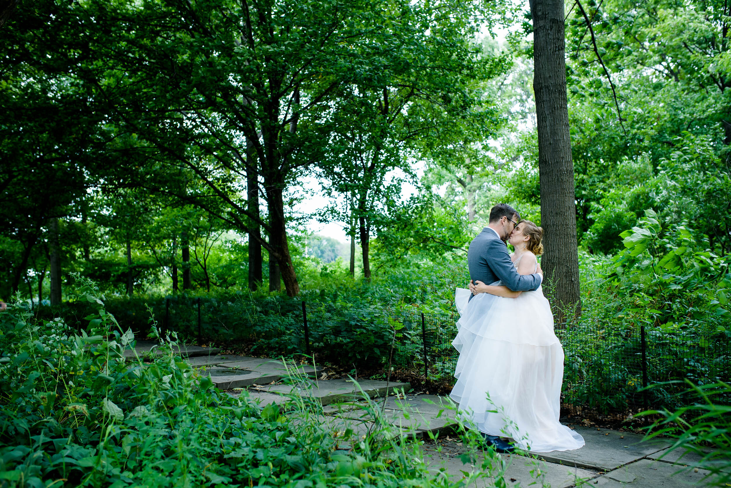 Bride and groom first look: Columbus Park Refectory Chicago wedding captured by J. Brown Photography.