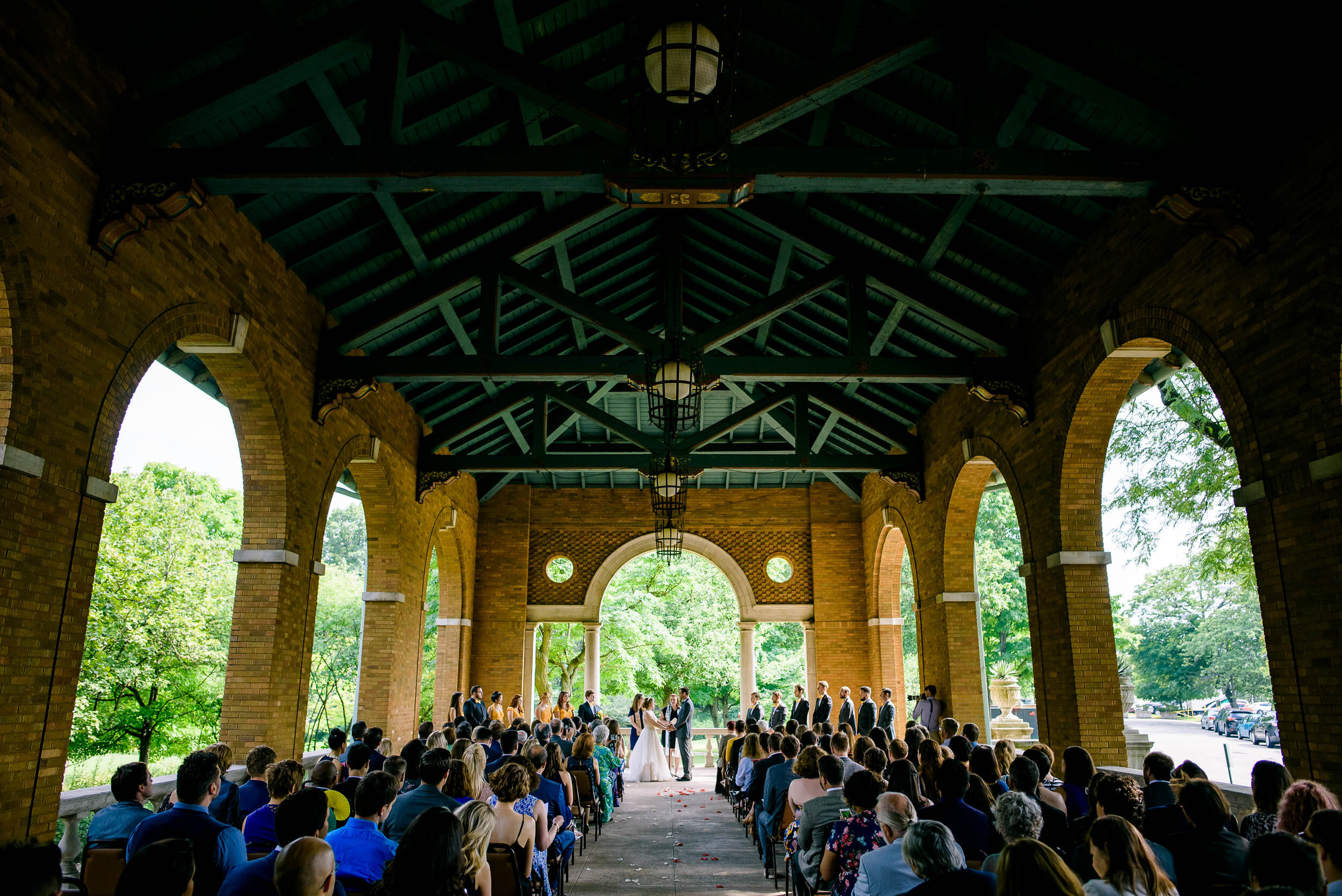 Wedding ceremony photo: Columbus Park Refectory Chicago wedding captured by J. Brown Photography.