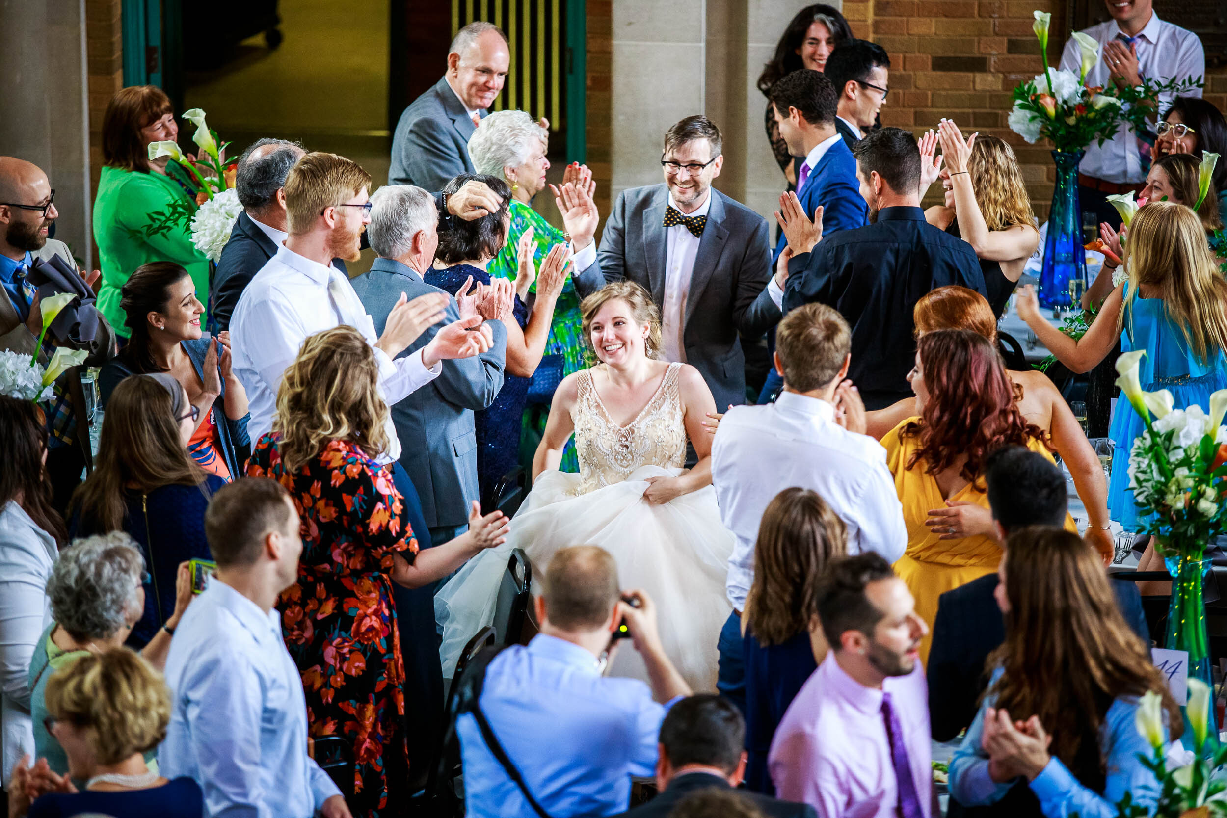 Couple introduction into their reception: Columbus Park Refectory Chicago wedding captured by J. Brown Photography.
