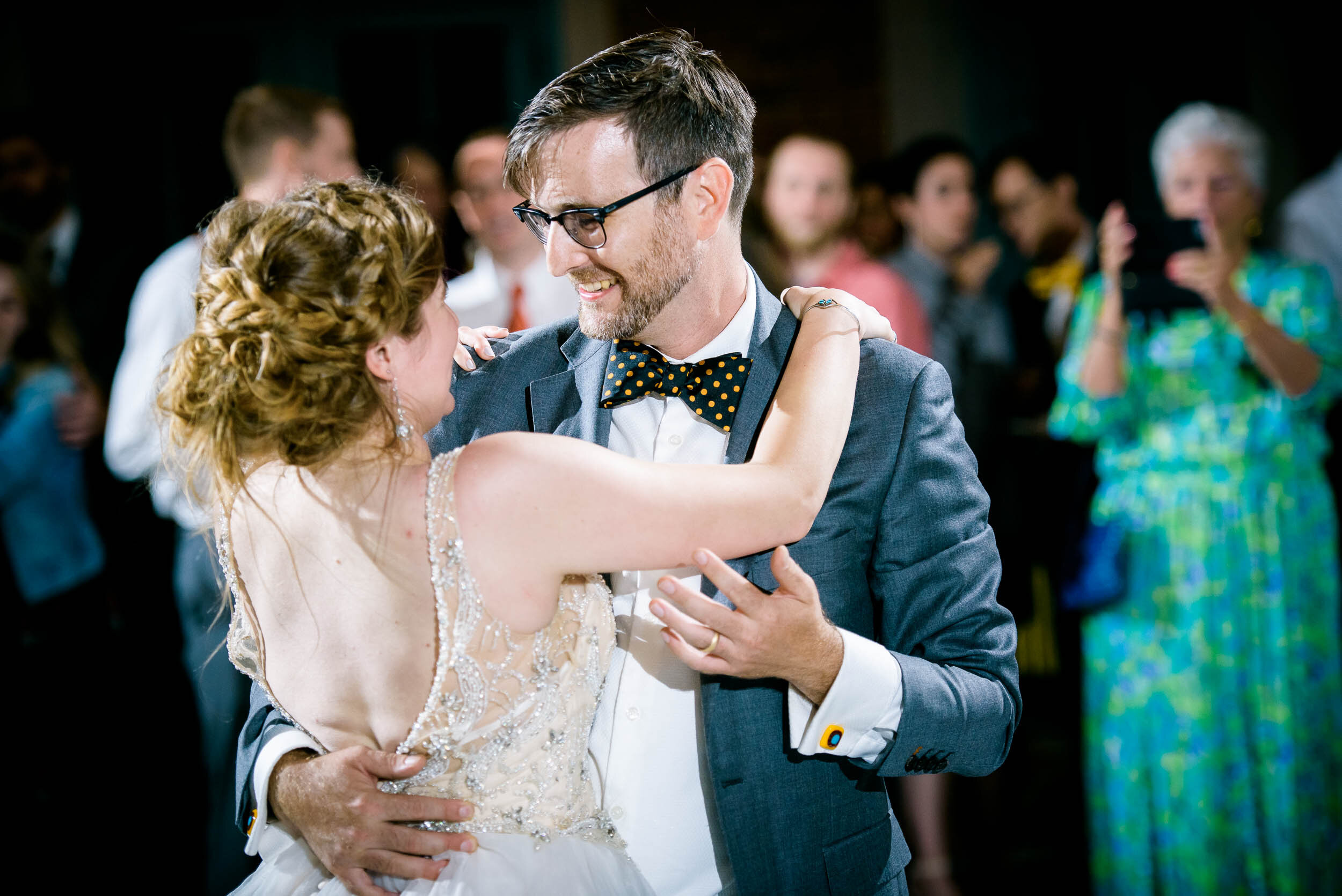 Couple's first dance during their reception: Columbus Park Refectory Chicago wedding captured by J. Brown Photography.