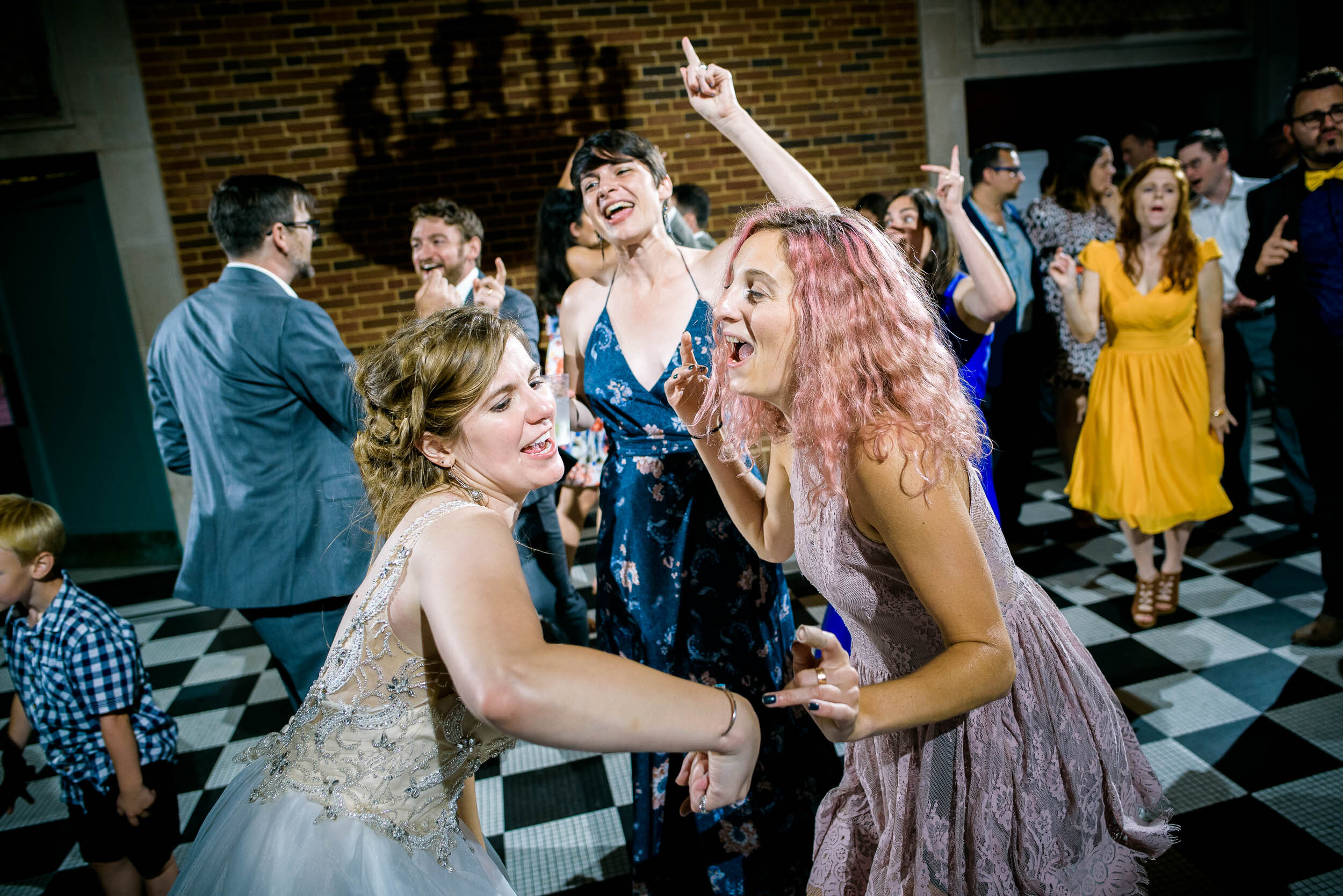 Fun wedding dancing photo: Columbus Park Refectory Chicago wedding captured by J. Brown Photography.