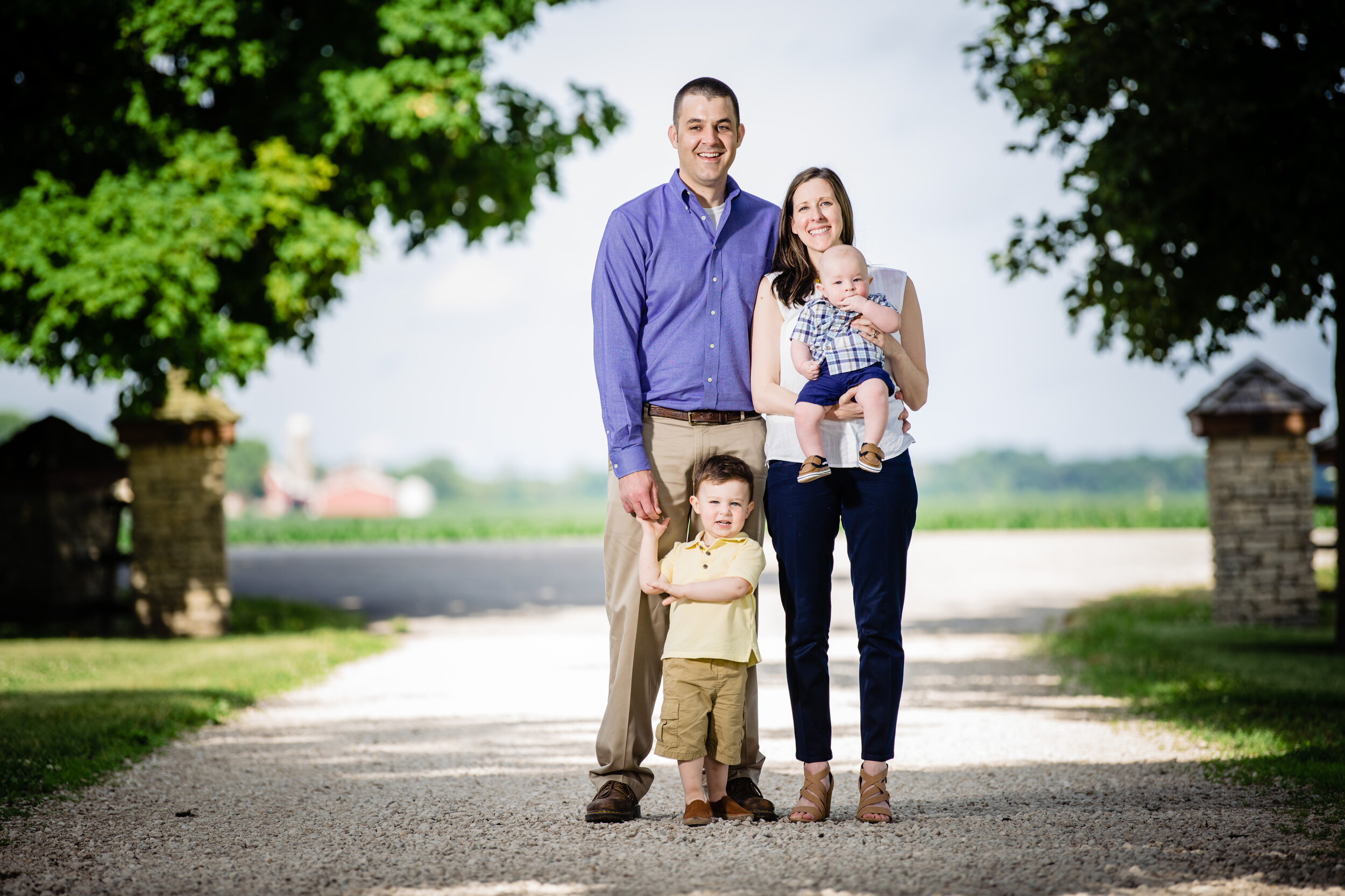 Family photo session in Sandwich, IL: family portrait session photographed by J. Brown Photography.