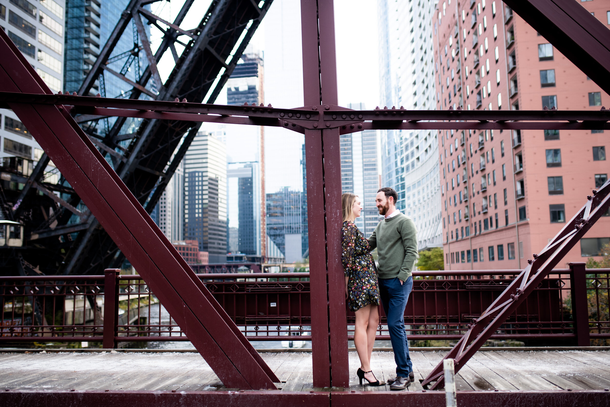 Creative engagement session on the Kinzie Street Bridge:  engagement photo captured by J. Brown Photography.