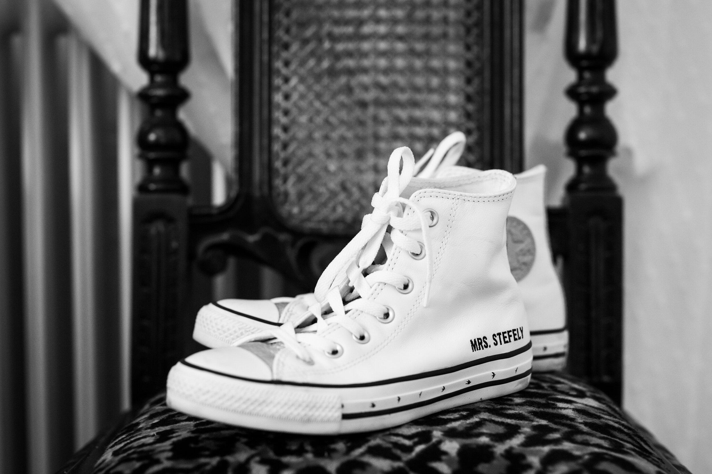 Monogrammed converse sneakers for the bride: destination wedding photo at the Lost Unicorn Hotel, Tsagarada, Greece by J. Brown Photography.