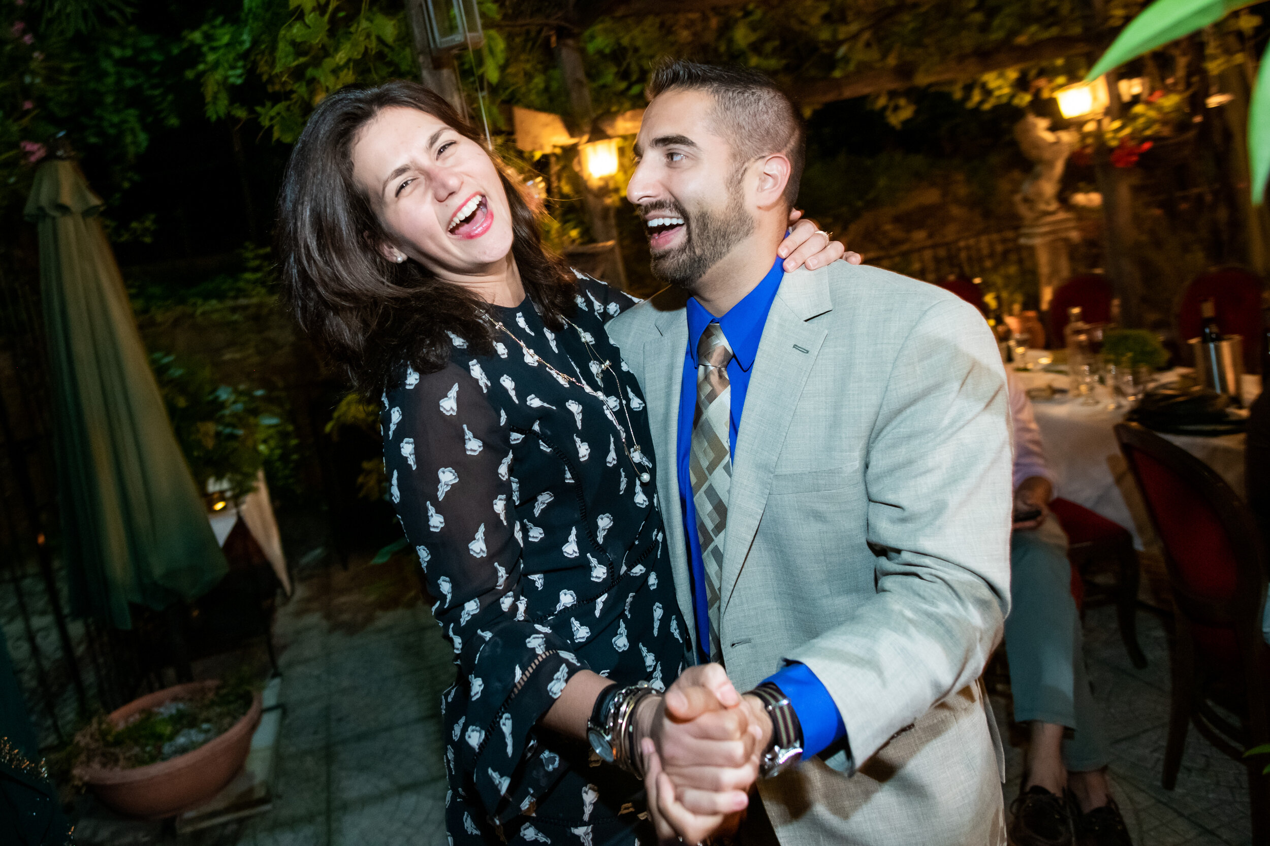 Couple dancing during an outdoor reception:  destination wedding photo at the Lost Unicorn Hotel, Tsagarada, Greece by J. Brown Photography.
