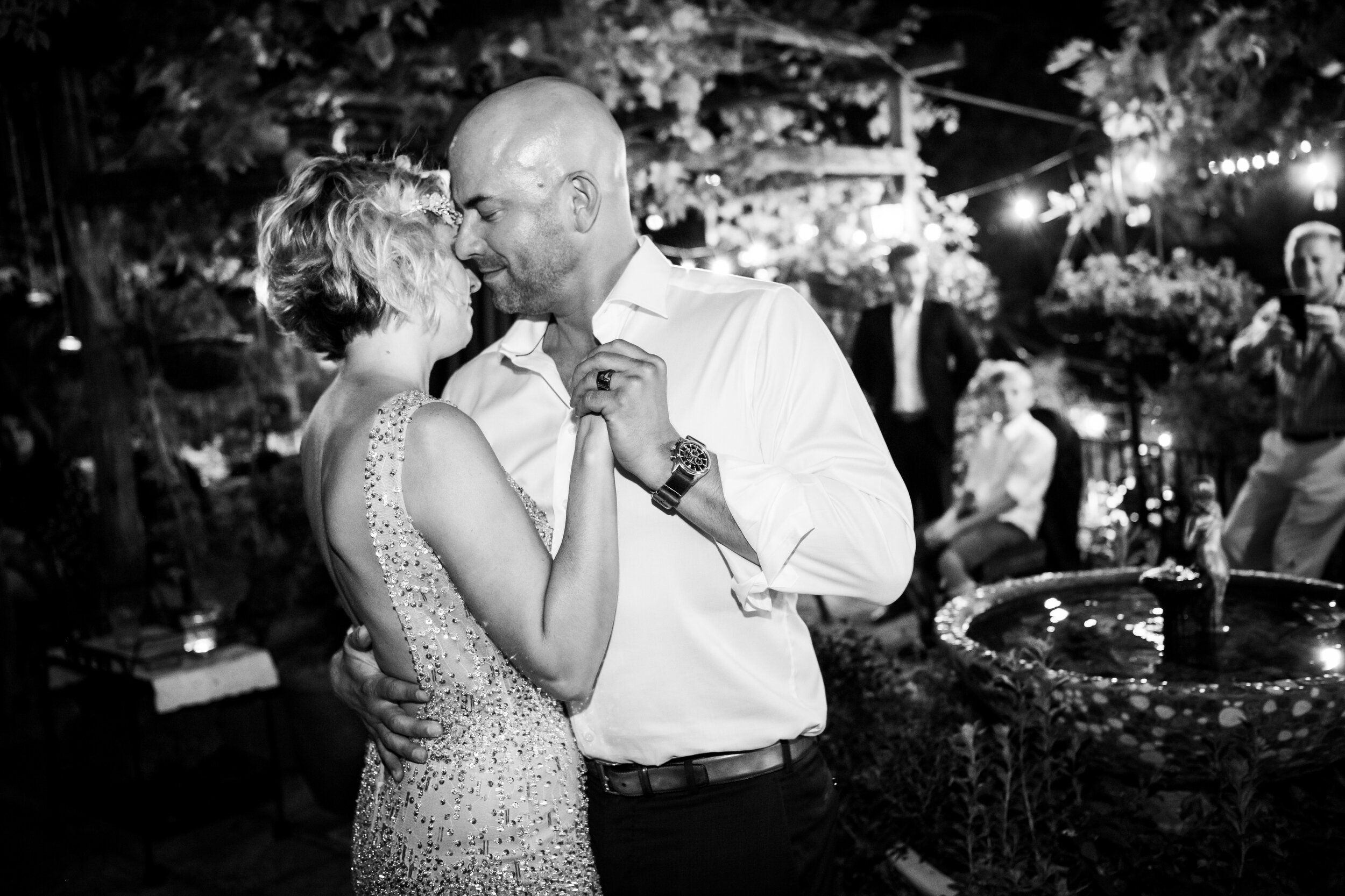 Bride and groom dance together during their reception:  destination wedding photo at the Lost Unicorn Hotel, Tsagarada, Greece by J. Brown Photography.