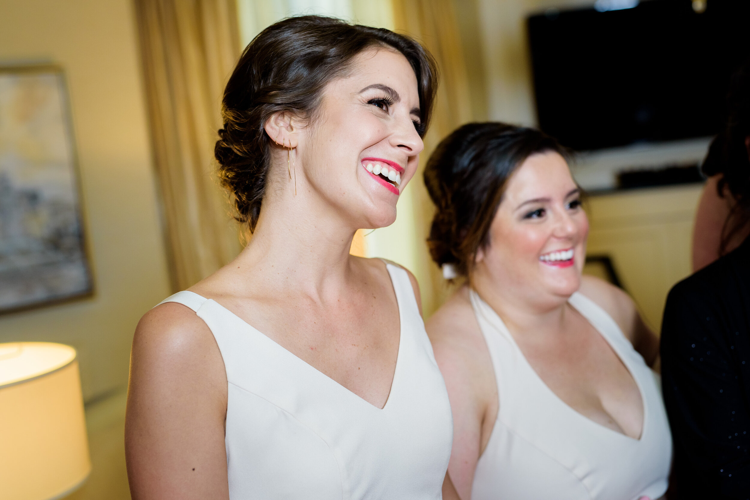 Maid-of-honor sees the bride for the first time: Geraghty Chicago wedding photography captured by J. Brown Photography.
