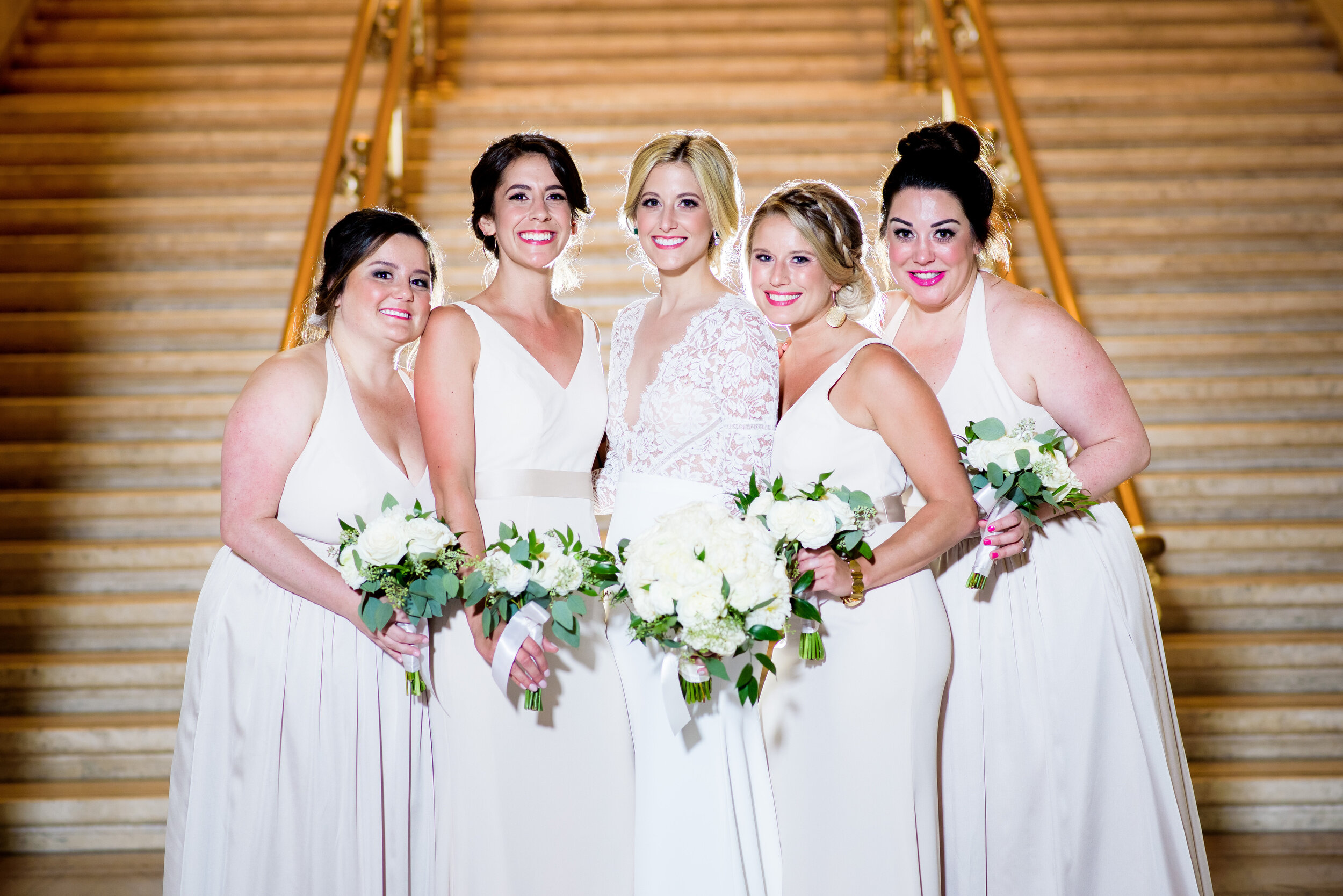 Bride and bridesmaids portrait at Union Station Chicago: Geraghty Chicago wedding photography captured by J. Brown Photography.