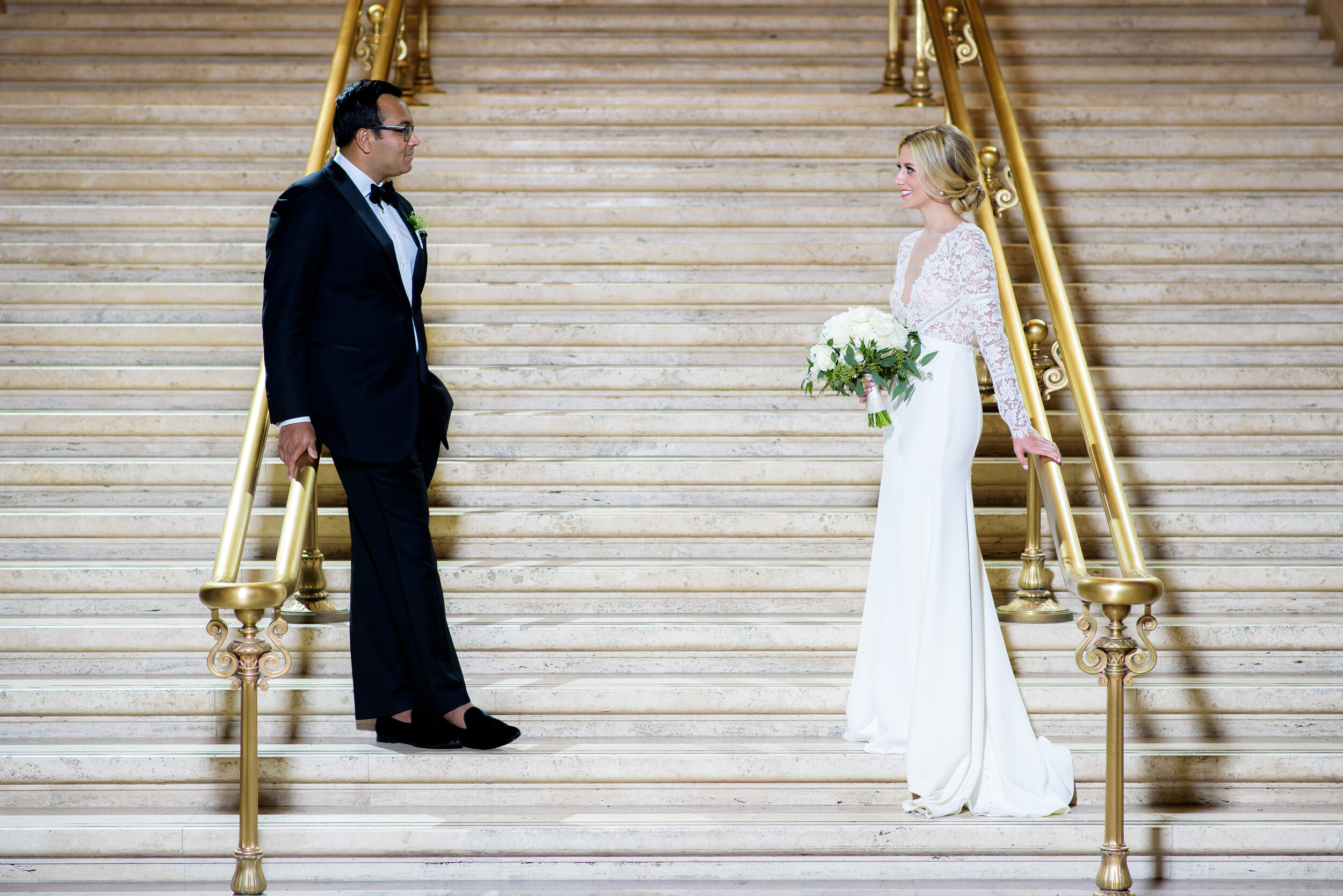 Wedding portrait of bride and groom at Chicago Union Station: Geraghty Chicago wedding photography captured by J. Brown Photography.
