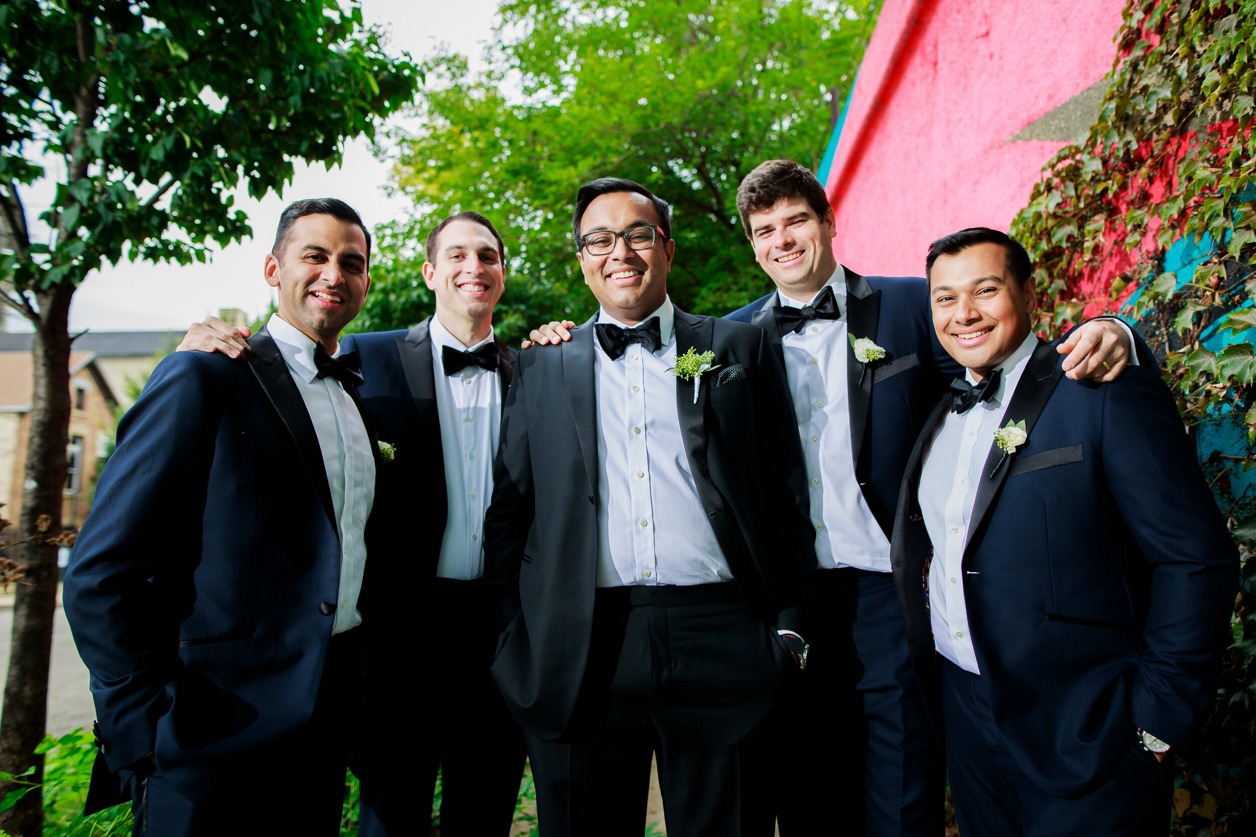 Fun groomsmen portrait in Pilsen: Geraghty Chicago wedding photography captured by J. Brown Photography.