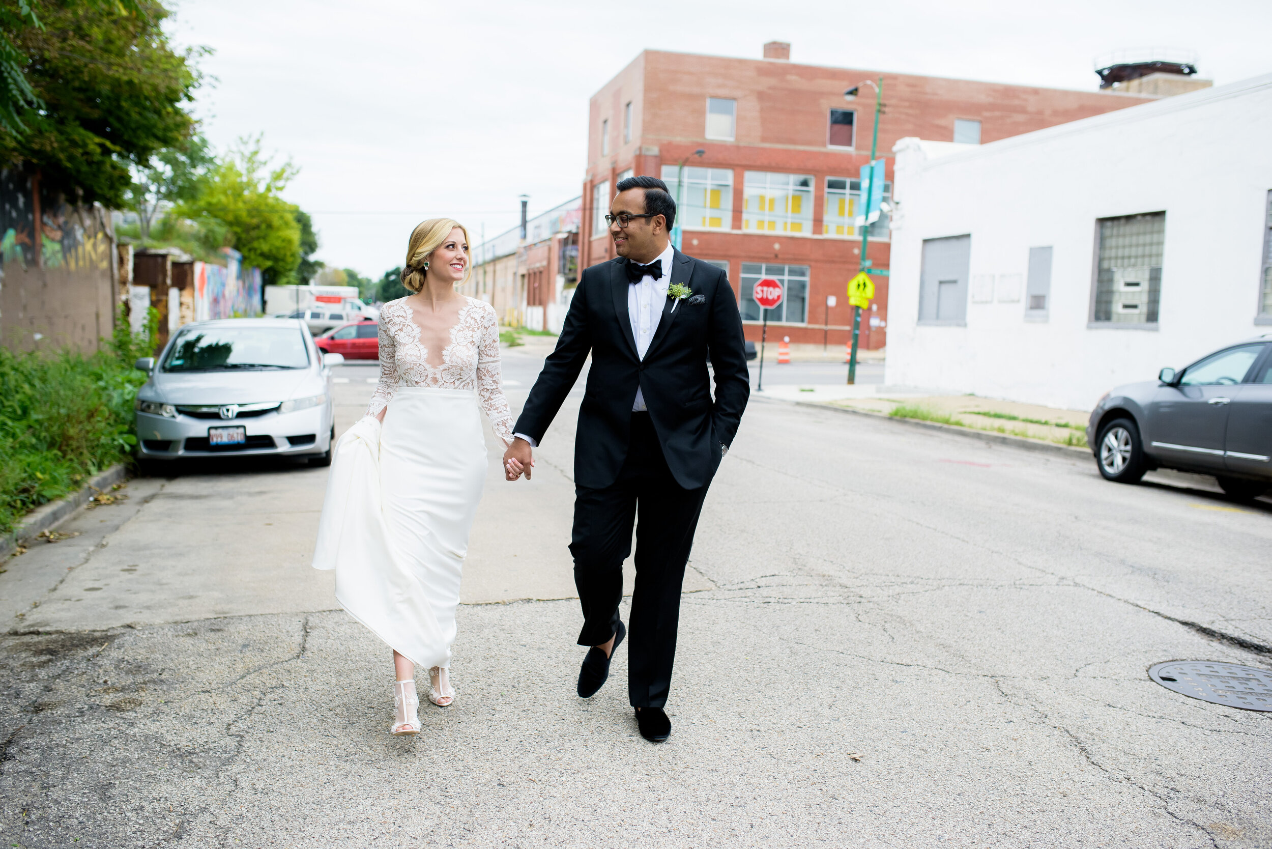 Candid wedding photo in Pilsen: Geraghty Chicago wedding photography captured by J. Brown Photography.
