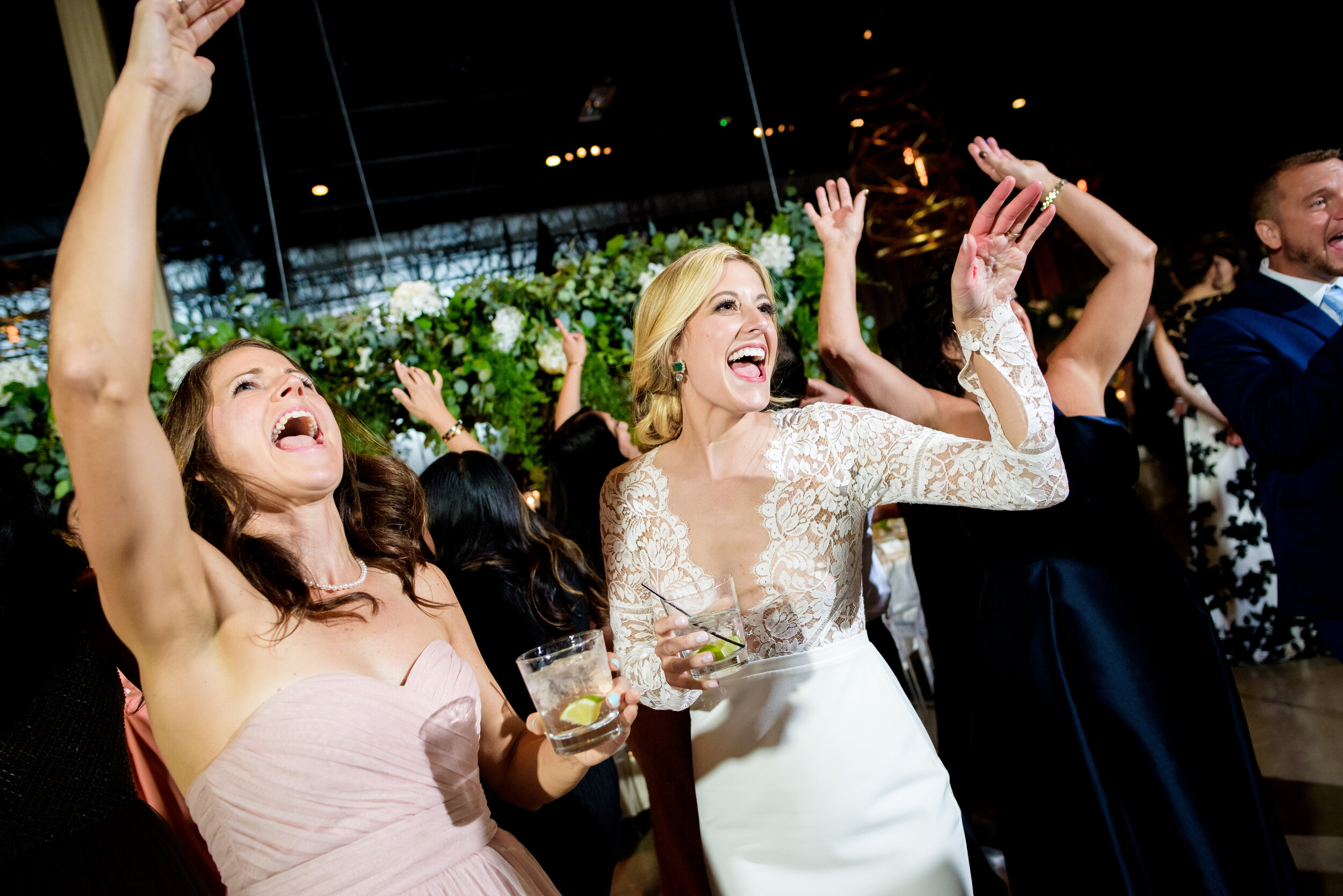Fun dance floor moment with the bride: Geraghty Chicago wedding photography by J. Brown Photography.