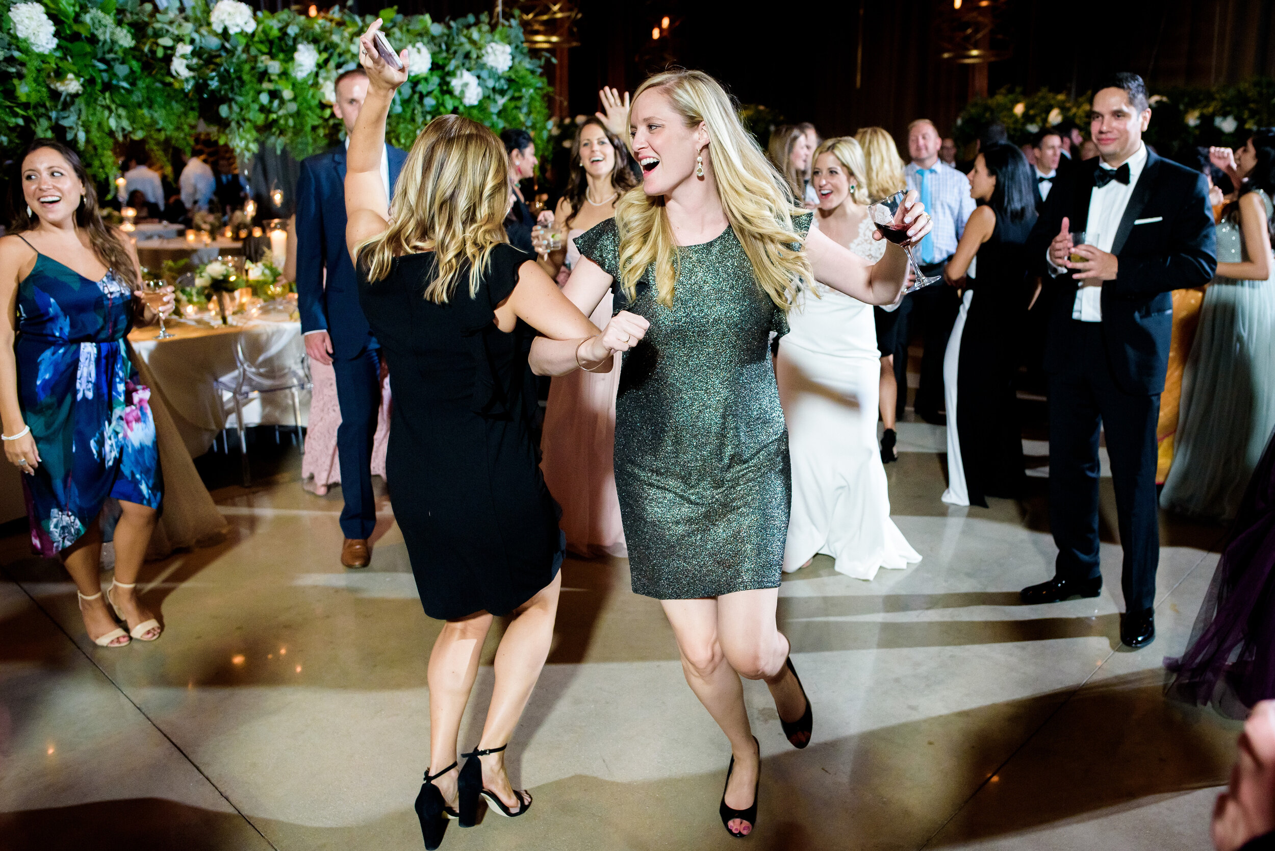 Dance floor moments: Geraghty Chicago wedding photography by J. Brown Photography.