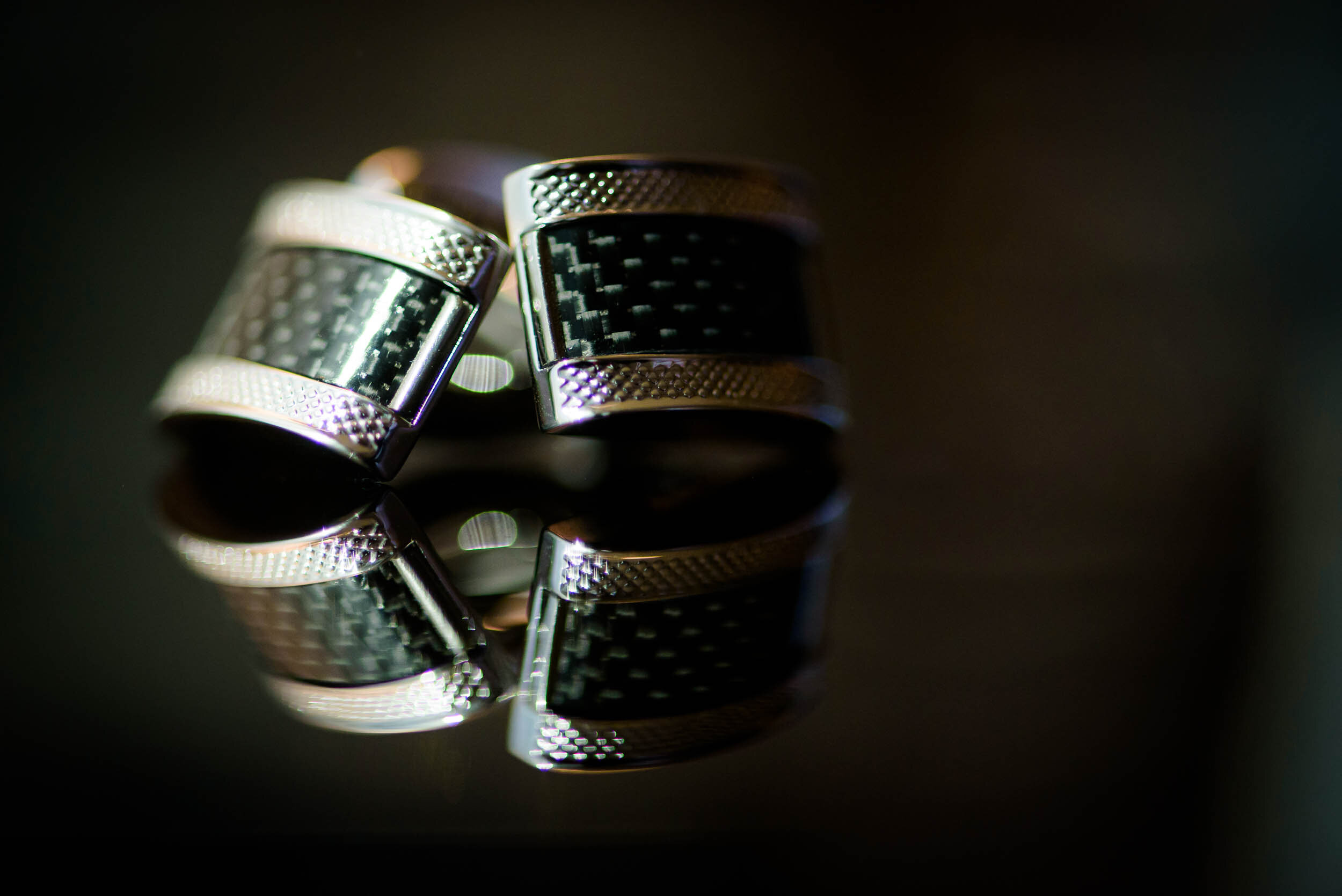 Detail photo of cufflinks: Ravenswood Event Center Chicago wedding captured by J. Brown Photography.  