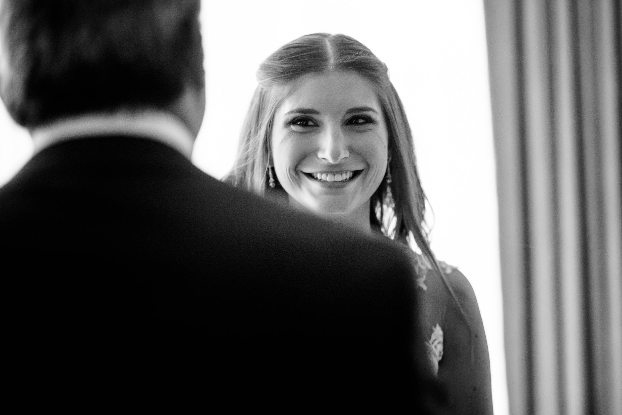 Bride first look with her dad: Ravenswood Event Center Chicago wedding captured by J. Brown Photography.  