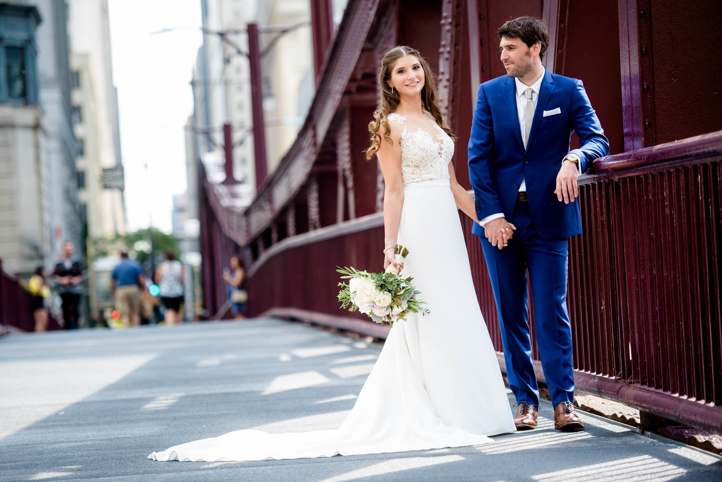 Wedding photo of bride and groom on LaSalle Street Bridge: Ravenswood Event Center Chicago wedding captured by J. Brown Photography.  