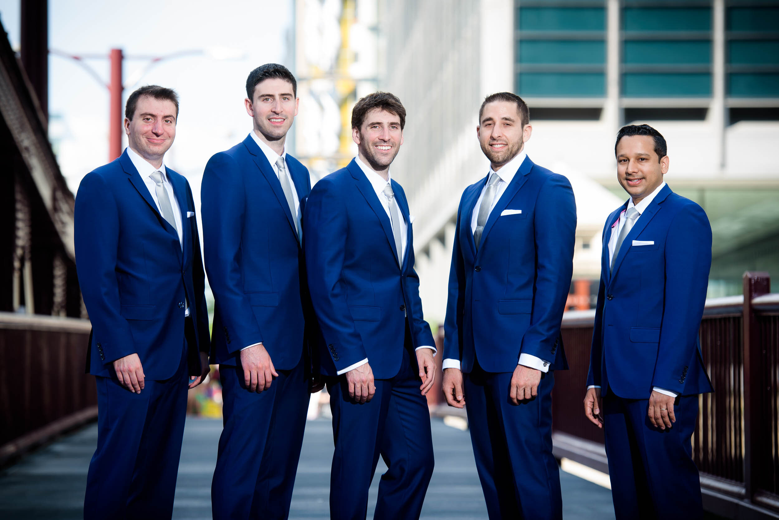 Groomsmen portrait on the Chicago River: Ravenswood Event Center Chicago wedding captured by J. Brown Photography.  