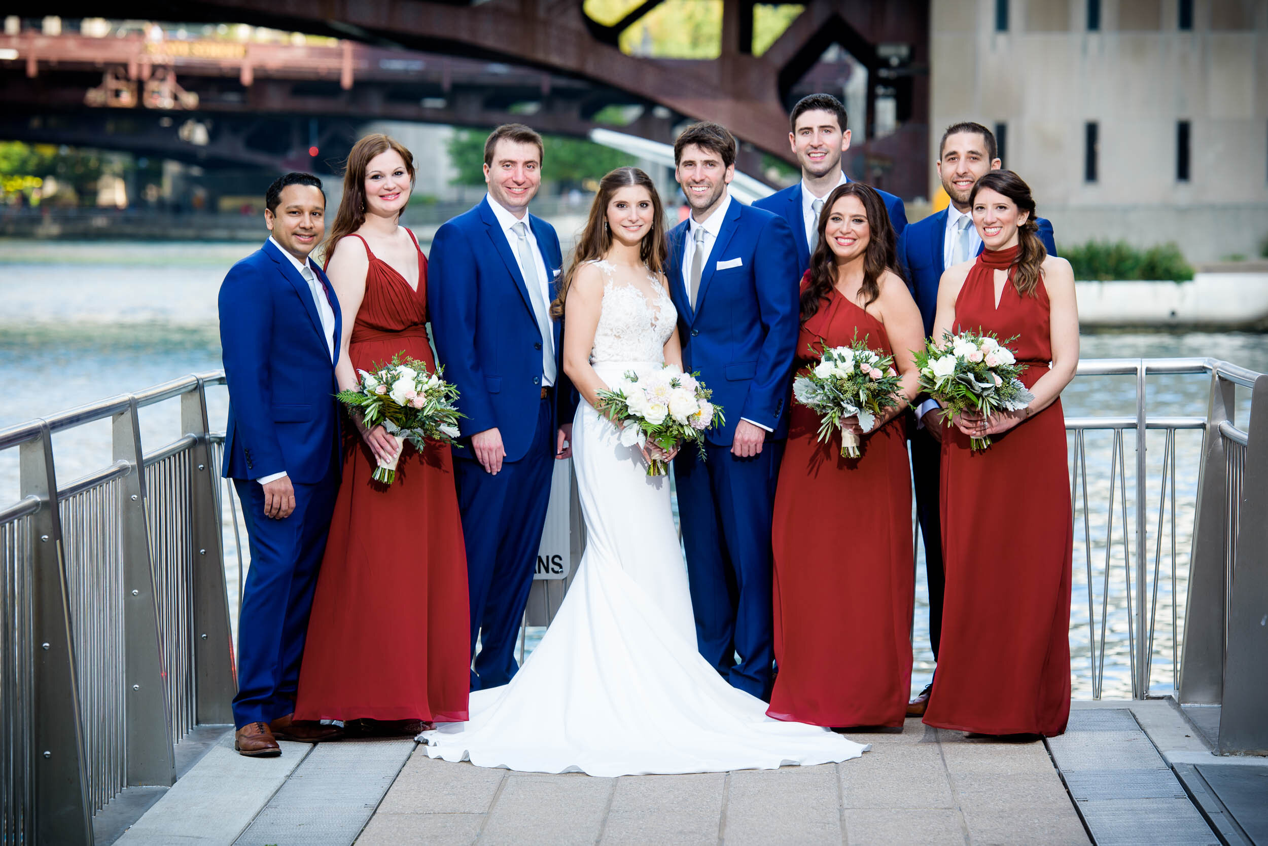 Wedding party portrait on the Chicago Riverwalk: Ravenswood Event Center Chicago wedding captured by J. Brown Photography.  