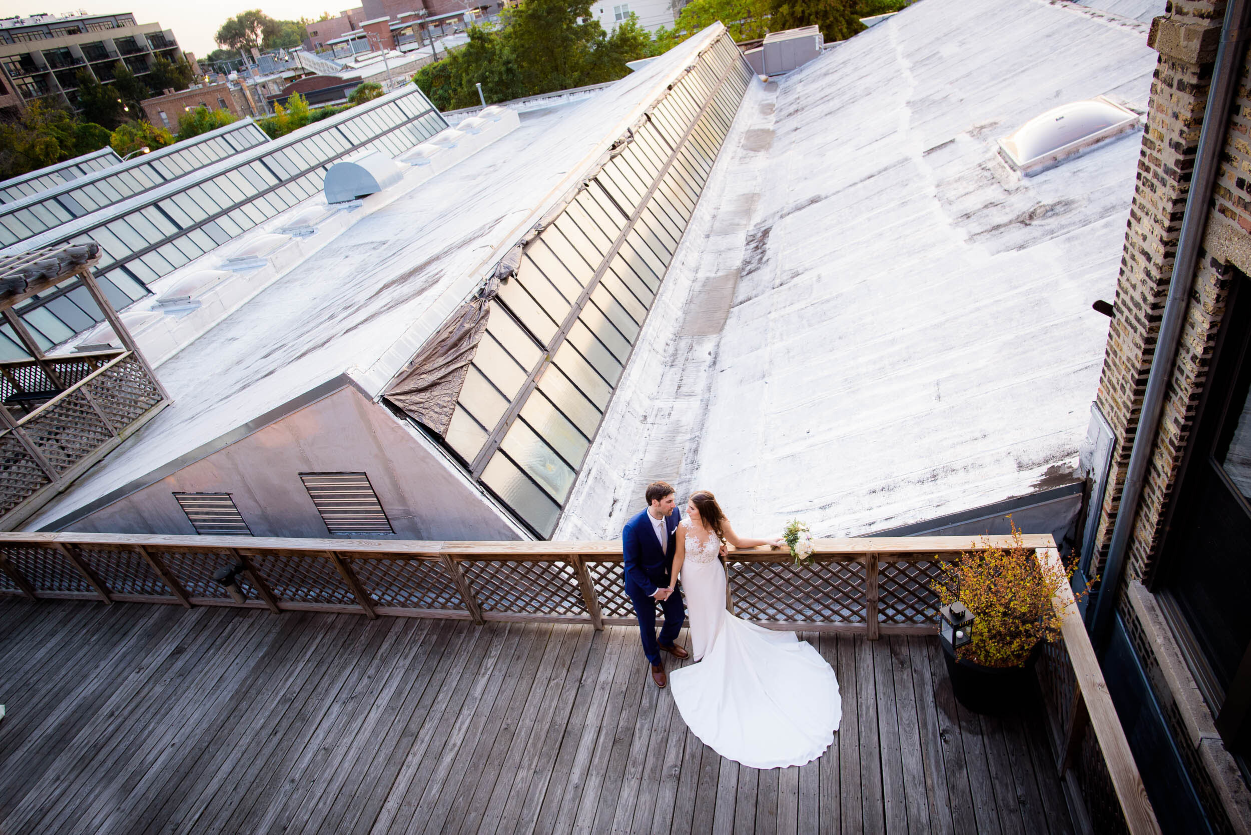 Creative fun photo of bride and groom: Ravenswood Event Center Chicago wedding captured by J. Brown Photography.  